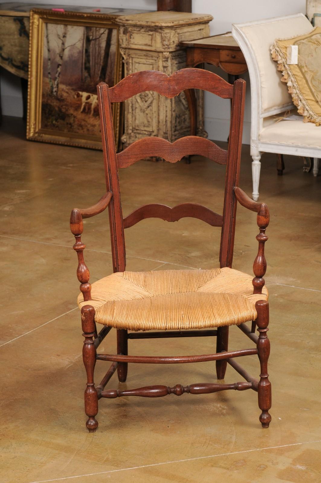 Rustic French 19th Century Walnut Armchairs with Rush Seats, Sold Individually In Good Condition For Sale In Atlanta, GA