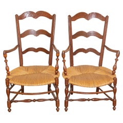 Rustic French 19th Century Walnut Armchairs with Rush Seats, Sold Individually