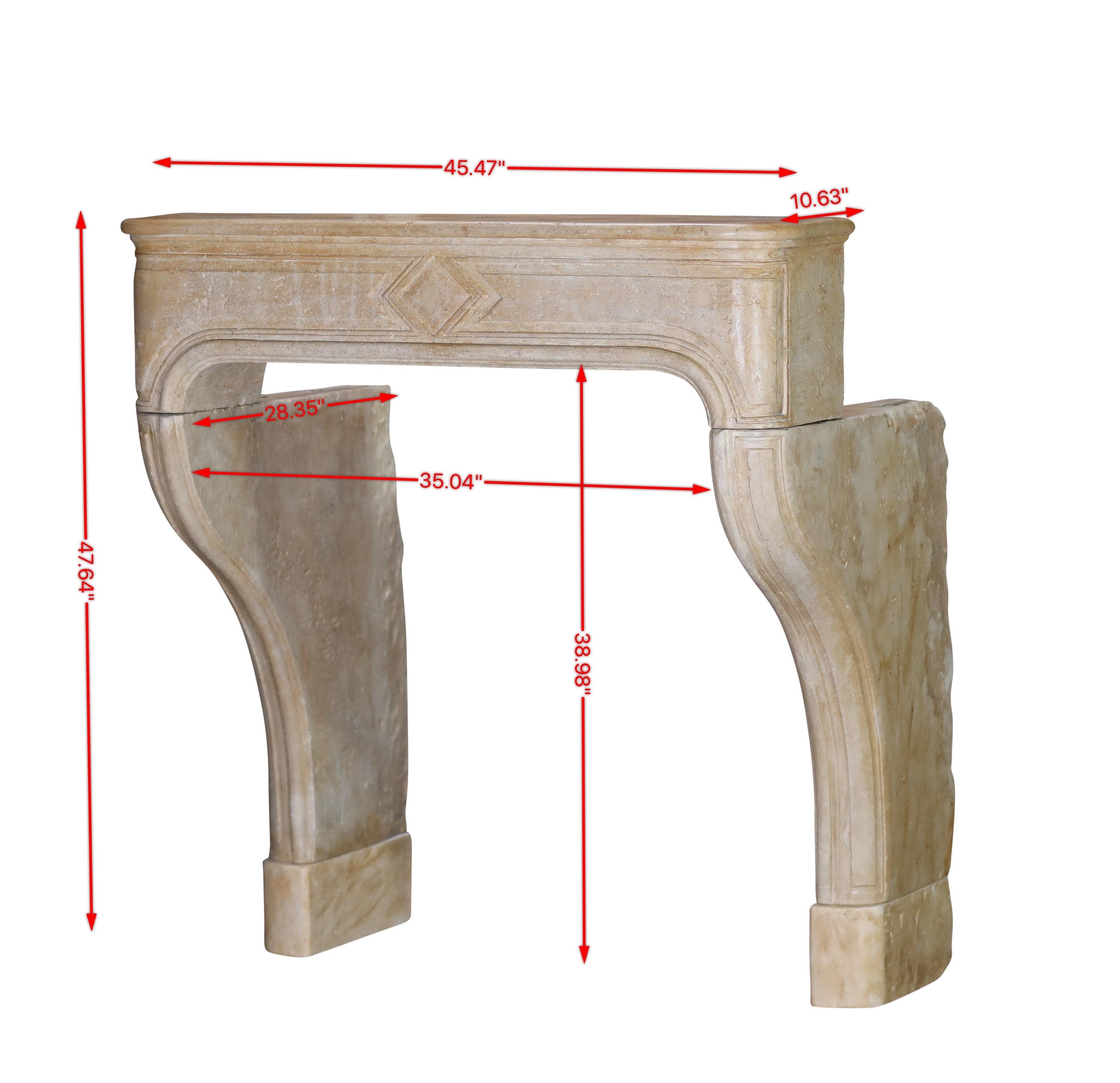 Extra small Louis XIV period fireplace surround in limestone. This reclaimed fireplace mantle with elegant jambs is unique its kind. It has some small artempo restorations and is ready to be installed.
Measurements:
115,5 cm Exterior Width 45,47