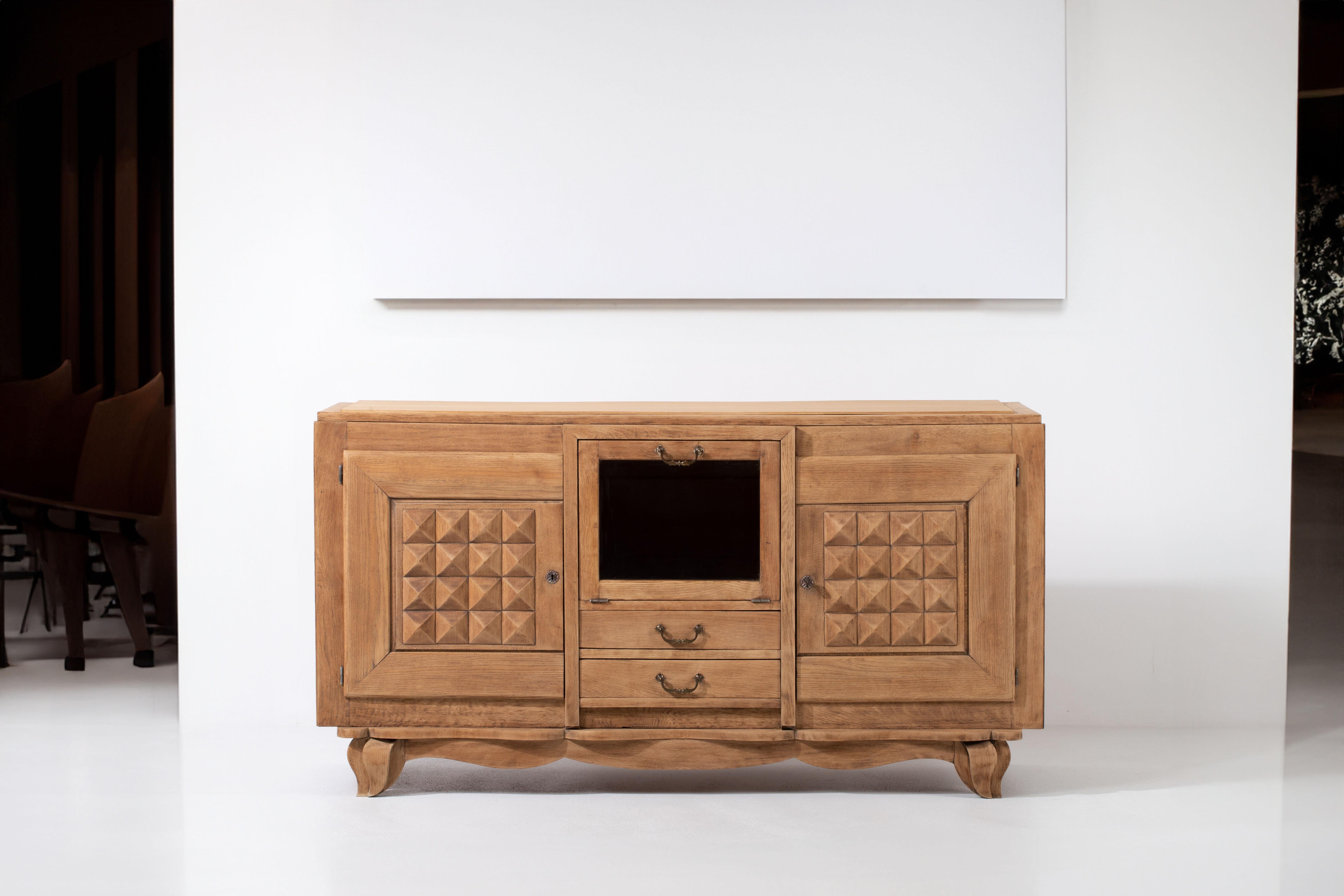 Mid-20th Century Rustic French Elegance : Enchanting Oak Sideboard from 1940 For Sale