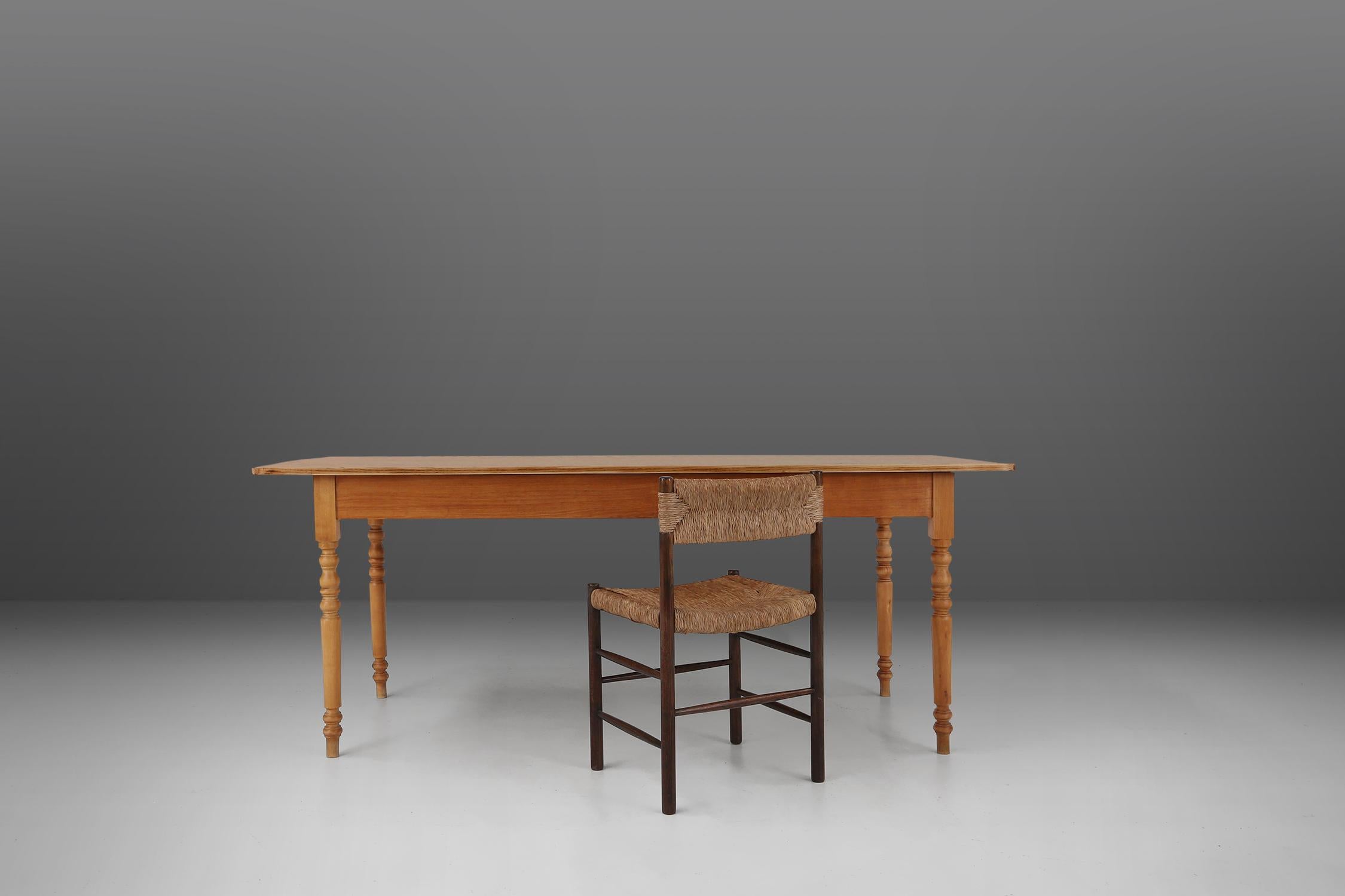 France / 1850 / farm table / wood / rustic

An exceptional antique French campaign dining table in wood with elegant turned legs. Crafted in France around 1850, this farm table will bring a touch of sophistication to your dining space. Made from
