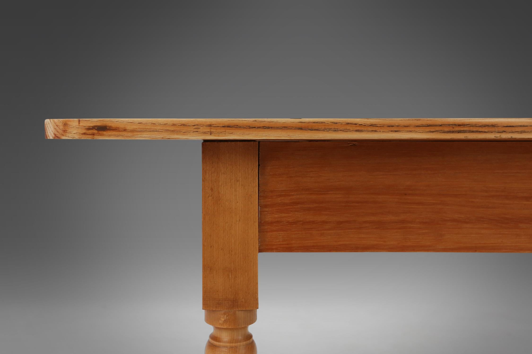 Mid-19th Century Rustic French farm table in wood with turned legs, ca. 1850 For Sale