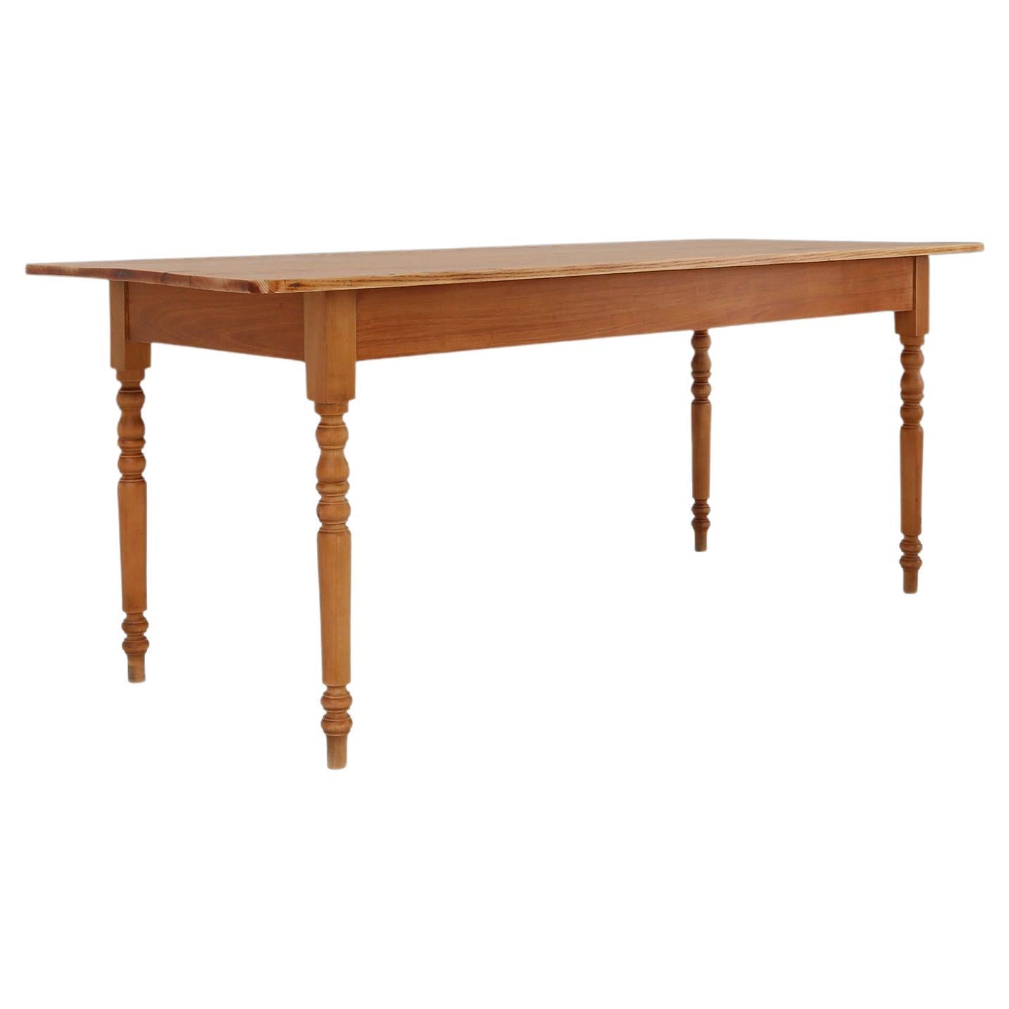 Rustic French farm table in wood with turned legs, ca. 1850 For Sale
