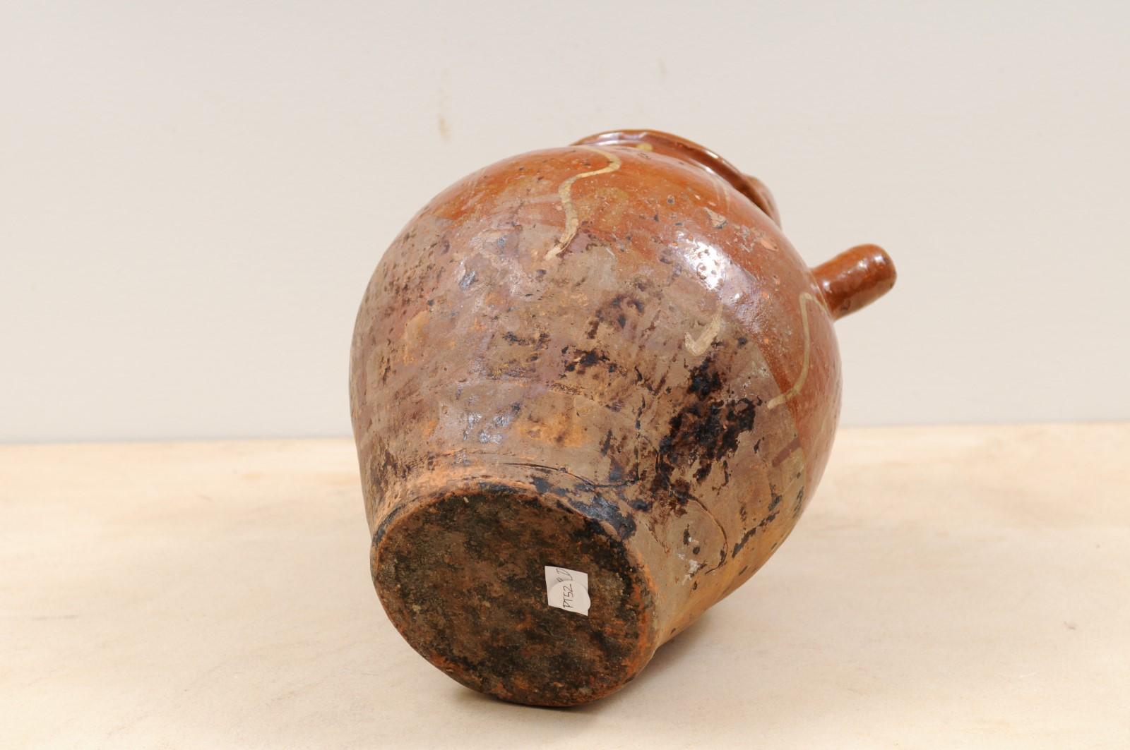 Rustic French Glazed Terracotta 19th Century Oil Jug with Distressed Appearance For Sale 7