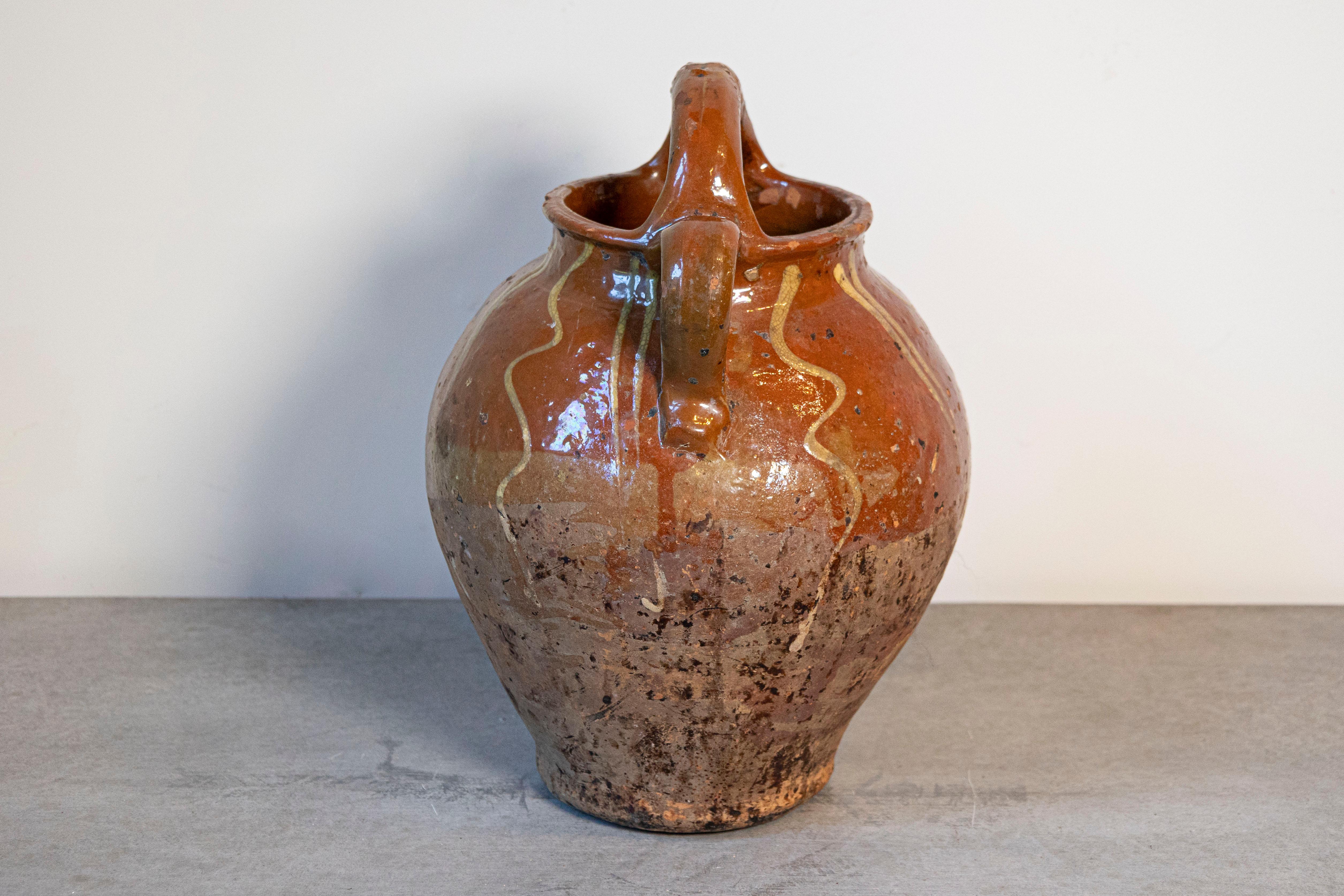 Rustic French Glazed Terracotta 19th Century Oil Jug with Distressed Appearance For Sale 1