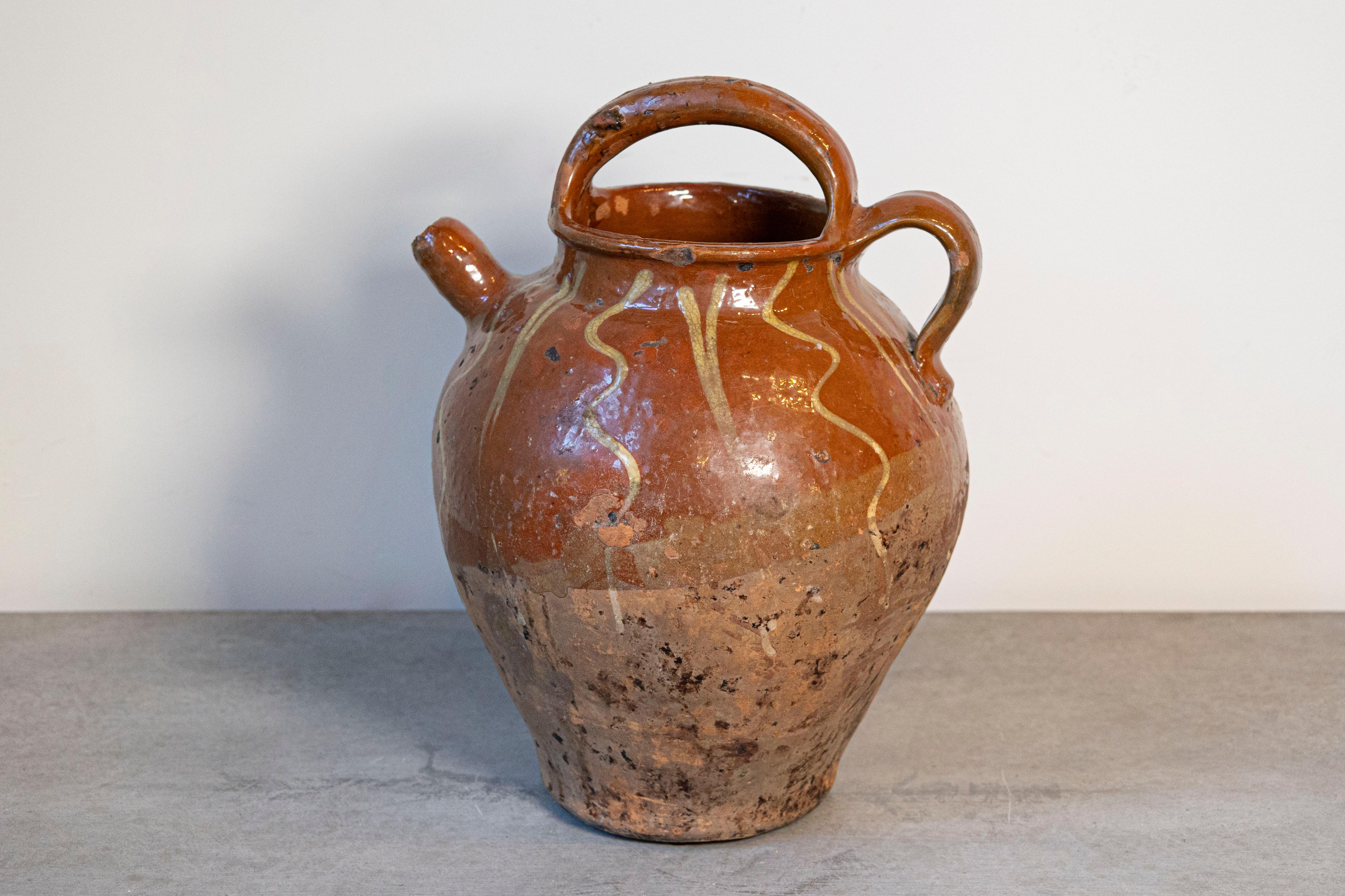 Rustic French Glazed Terracotta 19th Century Oil Jug with Distressed Appearance For Sale 2