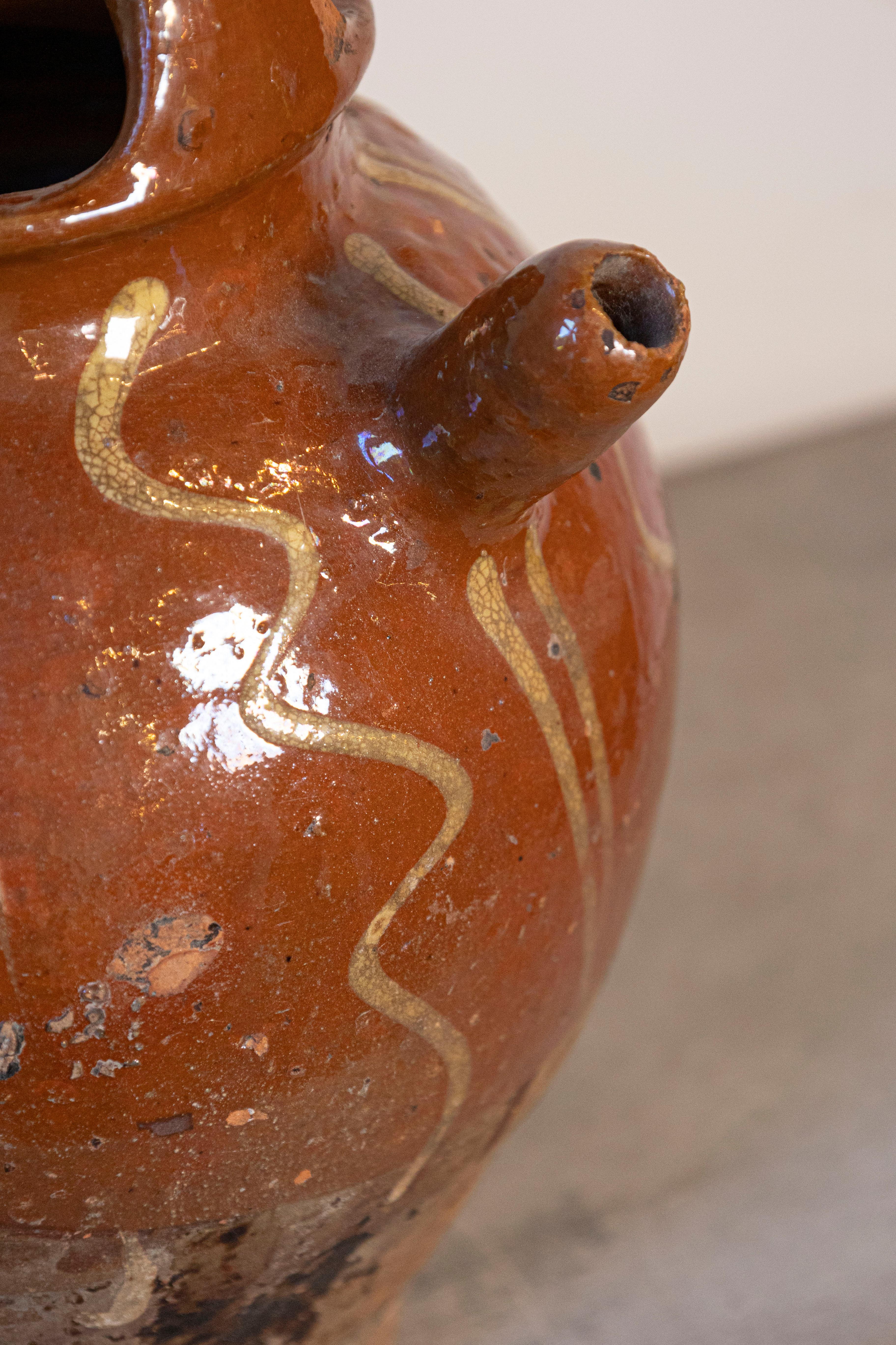 Rustic French Glazed Terracotta 19th Century Oil Jug with Distressed Appearance For Sale 3