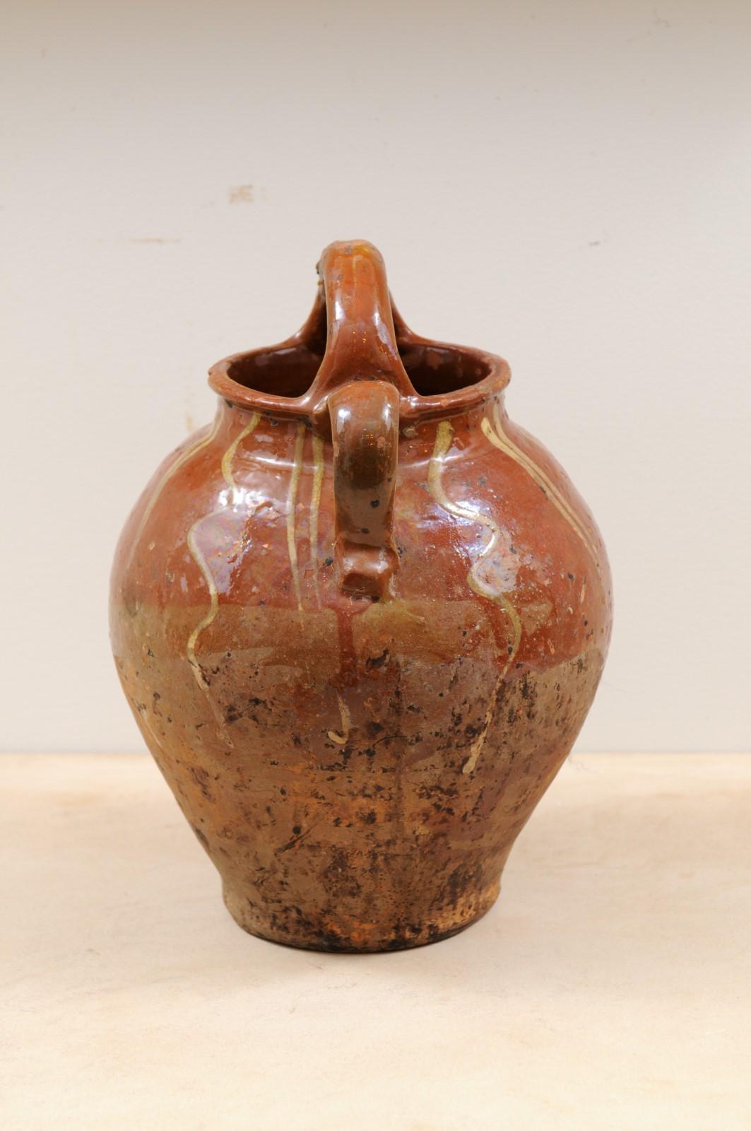 Rustic French Glazed Terracotta 19th Century Oil Jug with Distressed Appearance For Sale 4