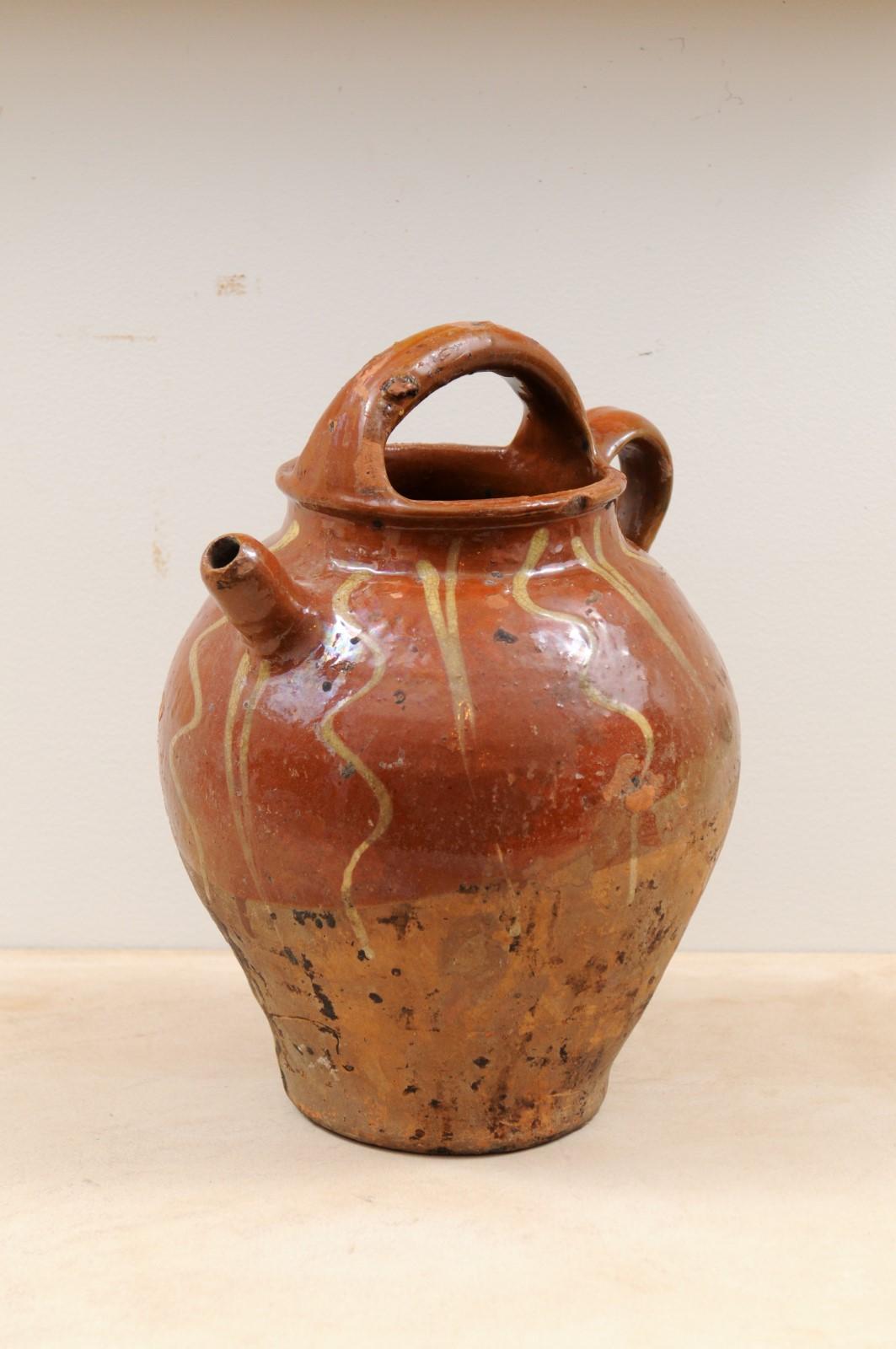 Rustic French Glazed Terracotta 19th Century Oil Jug with Distressed Appearance For Sale 5
