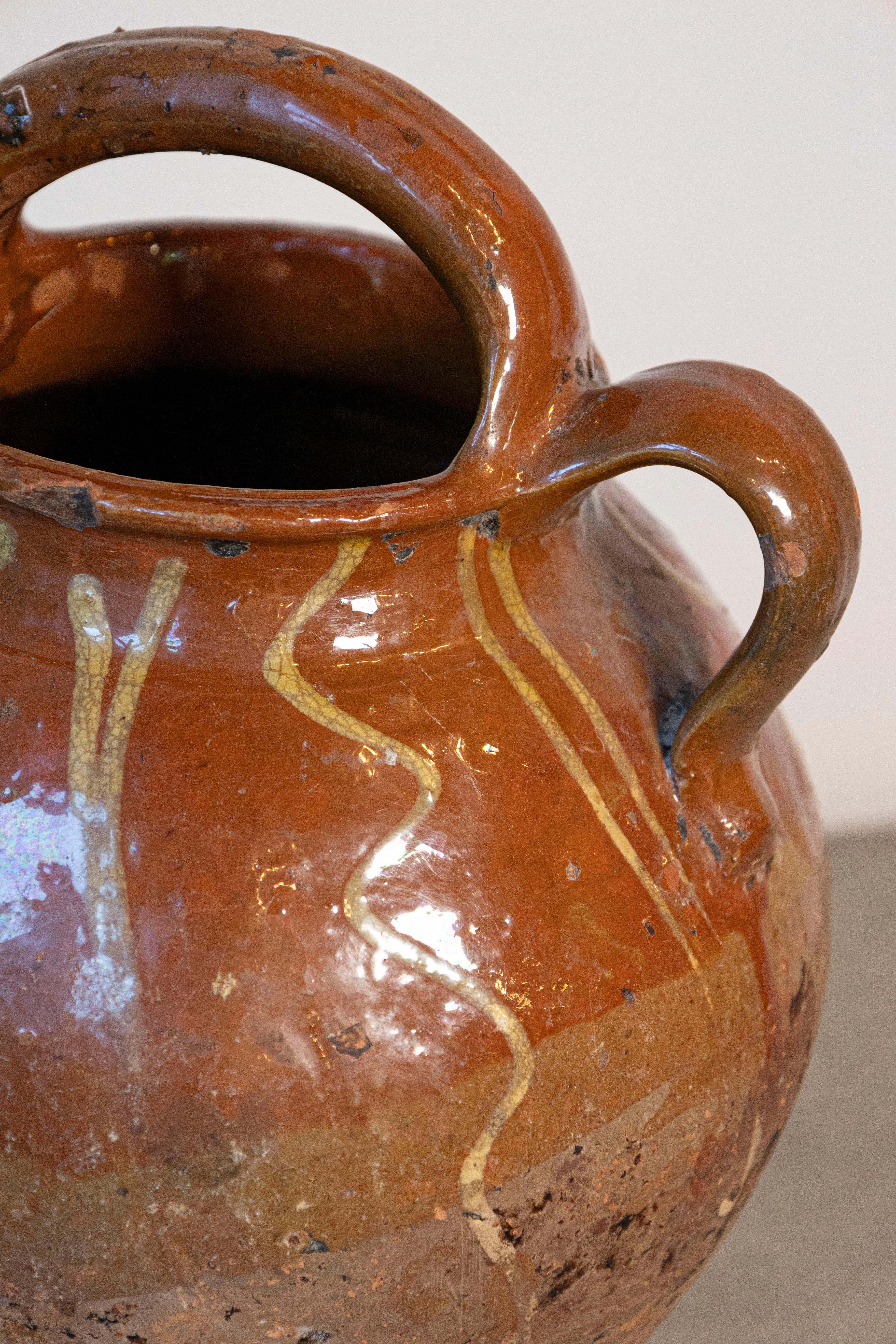 Rustic French Glazed Terracotta 19th Century Oil Jug with Distressed Appearance For Sale 5
