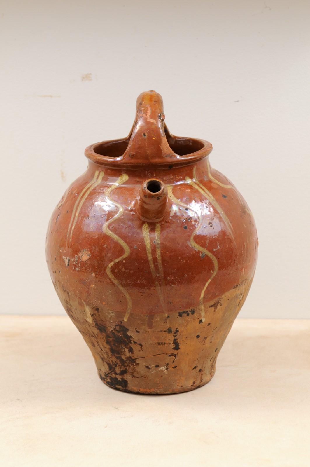 Rustic French Glazed Terracotta 19th Century Oil Jug with Distressed Appearance For Sale 6
