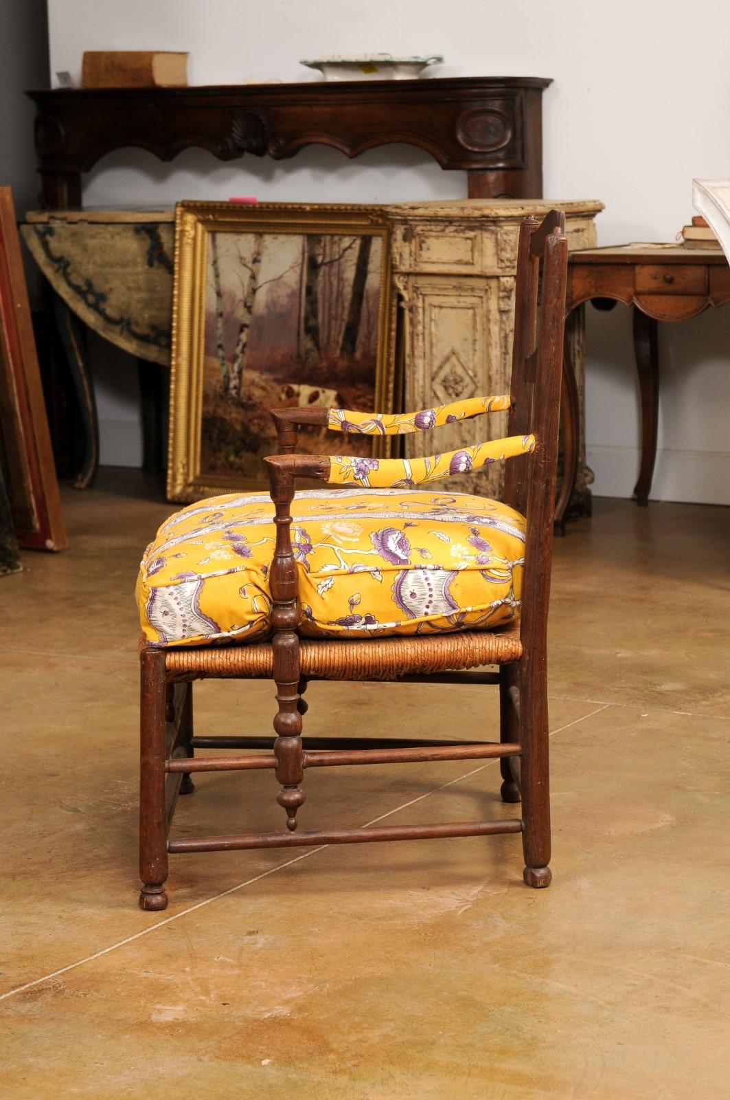 Rustic French Late 18th Century Walnut Armchair with Rush Seat and Cushion For Sale 5