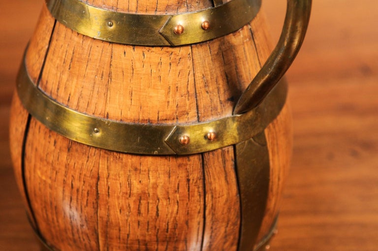 Rustic French Late 19th Century Wooden Wine Jug with Brass Accents at 1stDibs
