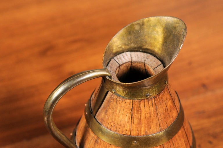 Rustic French Late 19th Century Wooden Wine Jug with Brass Accents at
