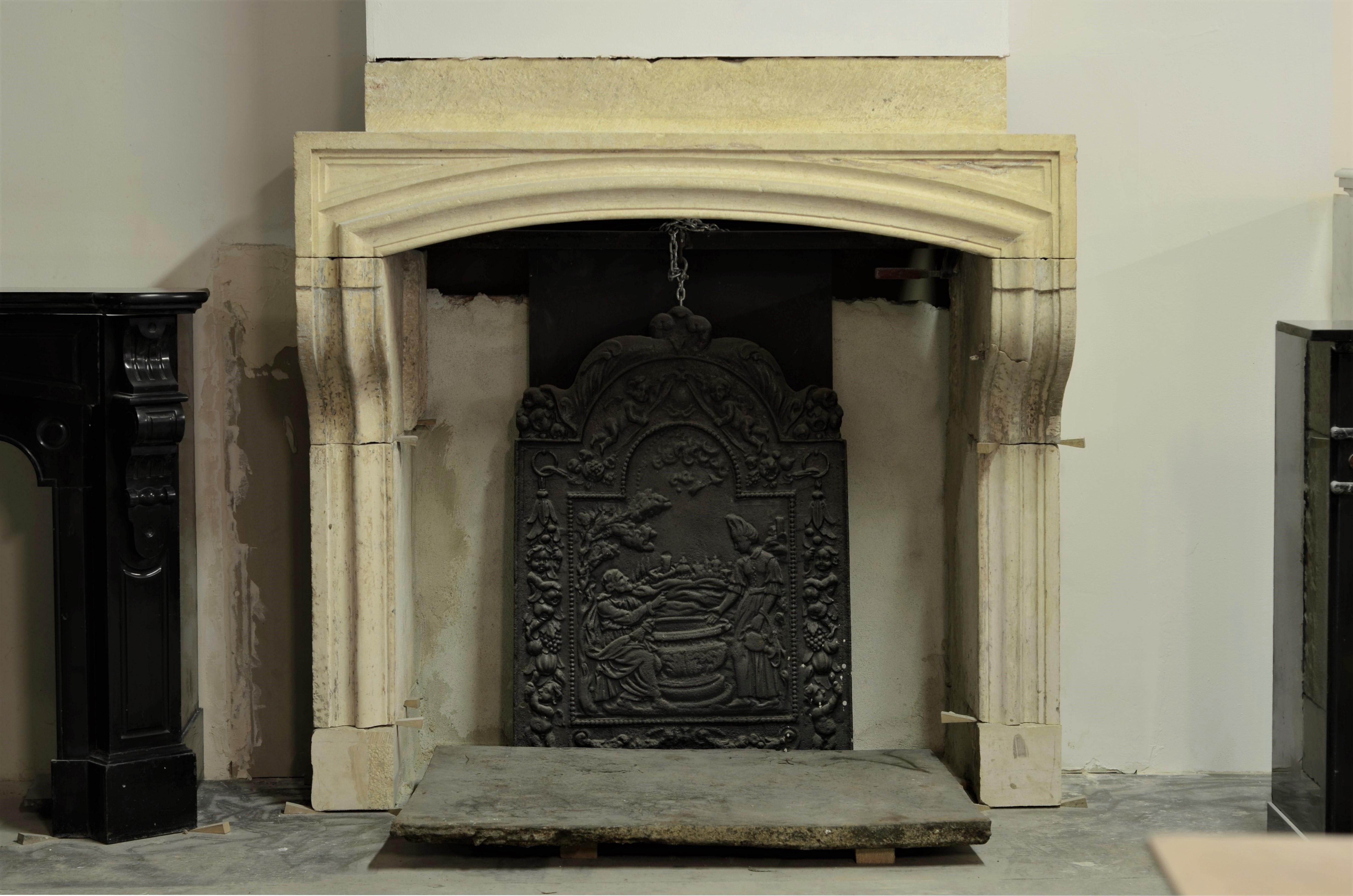 A nice and tall profiled French Louis XIV fireplace mantel in soft-toned limestone.
This early 19th century rustic mantel has a nice overhang, strong profiles and an exceptional frieze.
The frieze and start of the overmantel are made from one