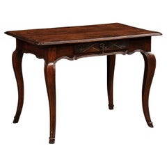 Rustic French Louis XV Style Walnut Table with Carved Drawer and Cabriole Legs