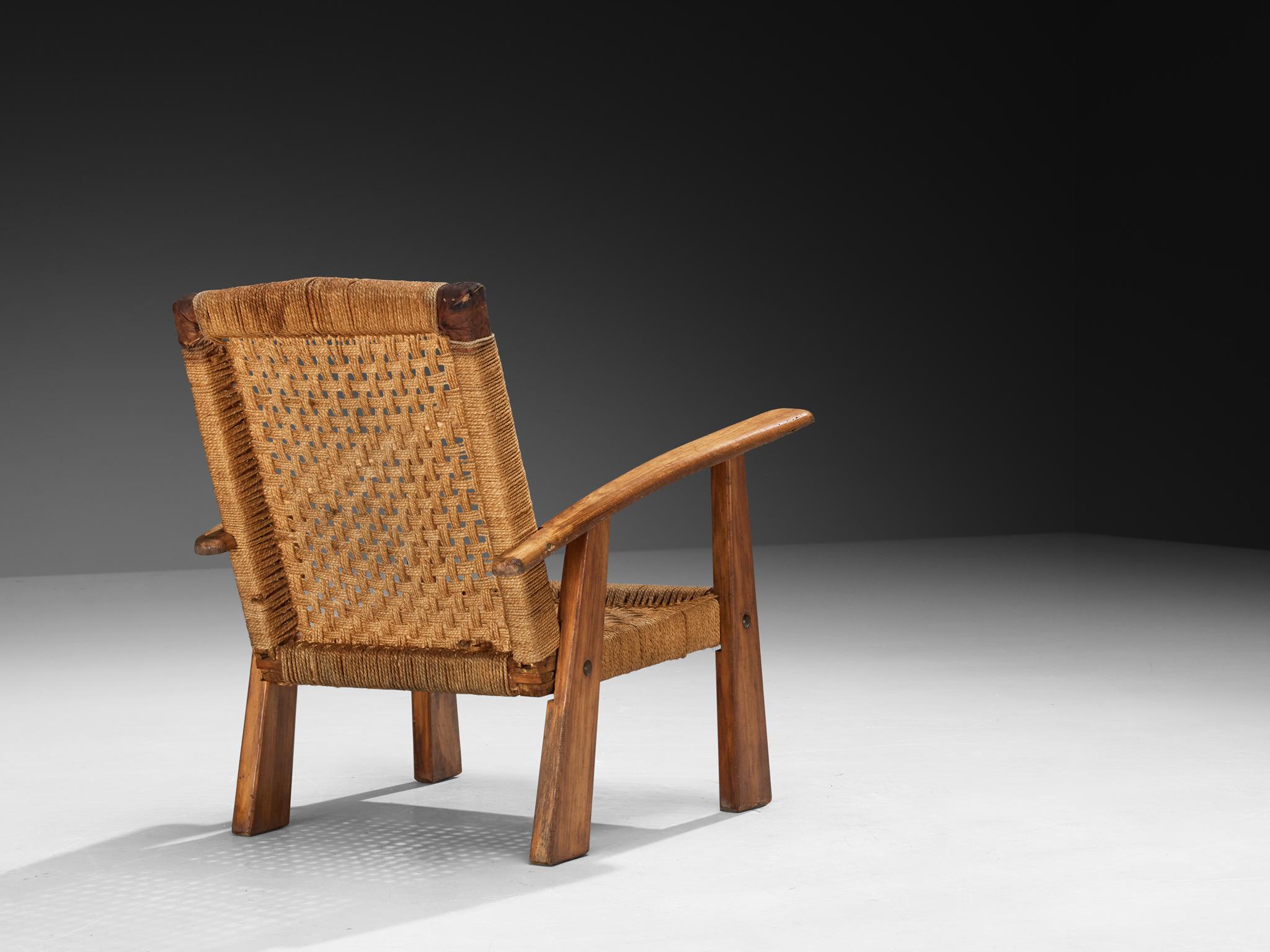 Mid-20th Century Rustic French Lounge Chair in Rush and Wood For Sale