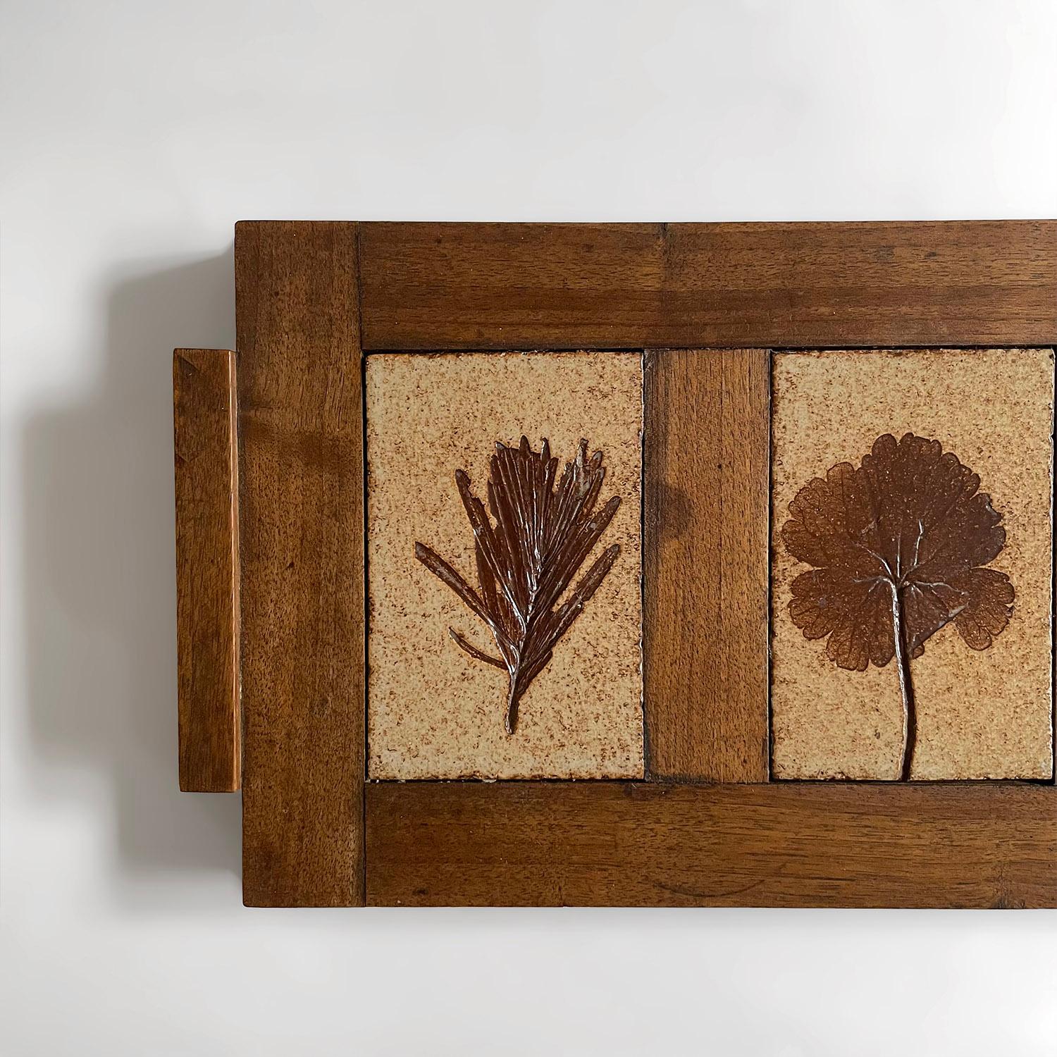 French oak & stoneware tray
France, mid century
Solid oak tray with wonderful wood grain and joinery
Beautifully worn in from years of use, the wood has light surface markings and has been newly reconditioned
Adorned with handmade stoneware tiles