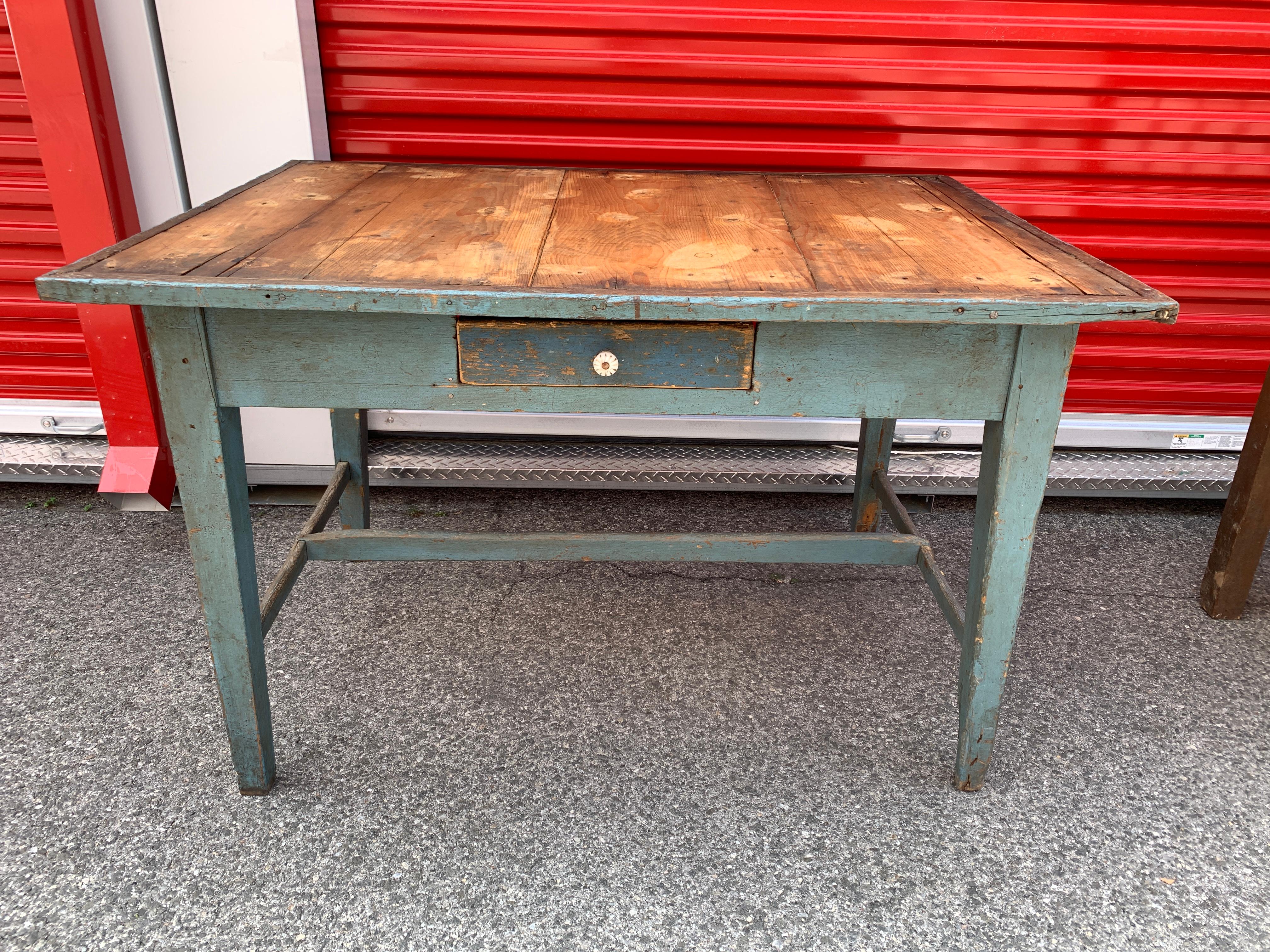 An occasional table with perfectly aged oak wood that would go well as an entry table, desk or small kitchen island. Original light blue paint which would compliment a bohemian chic household.
Drawer comes with dividers.