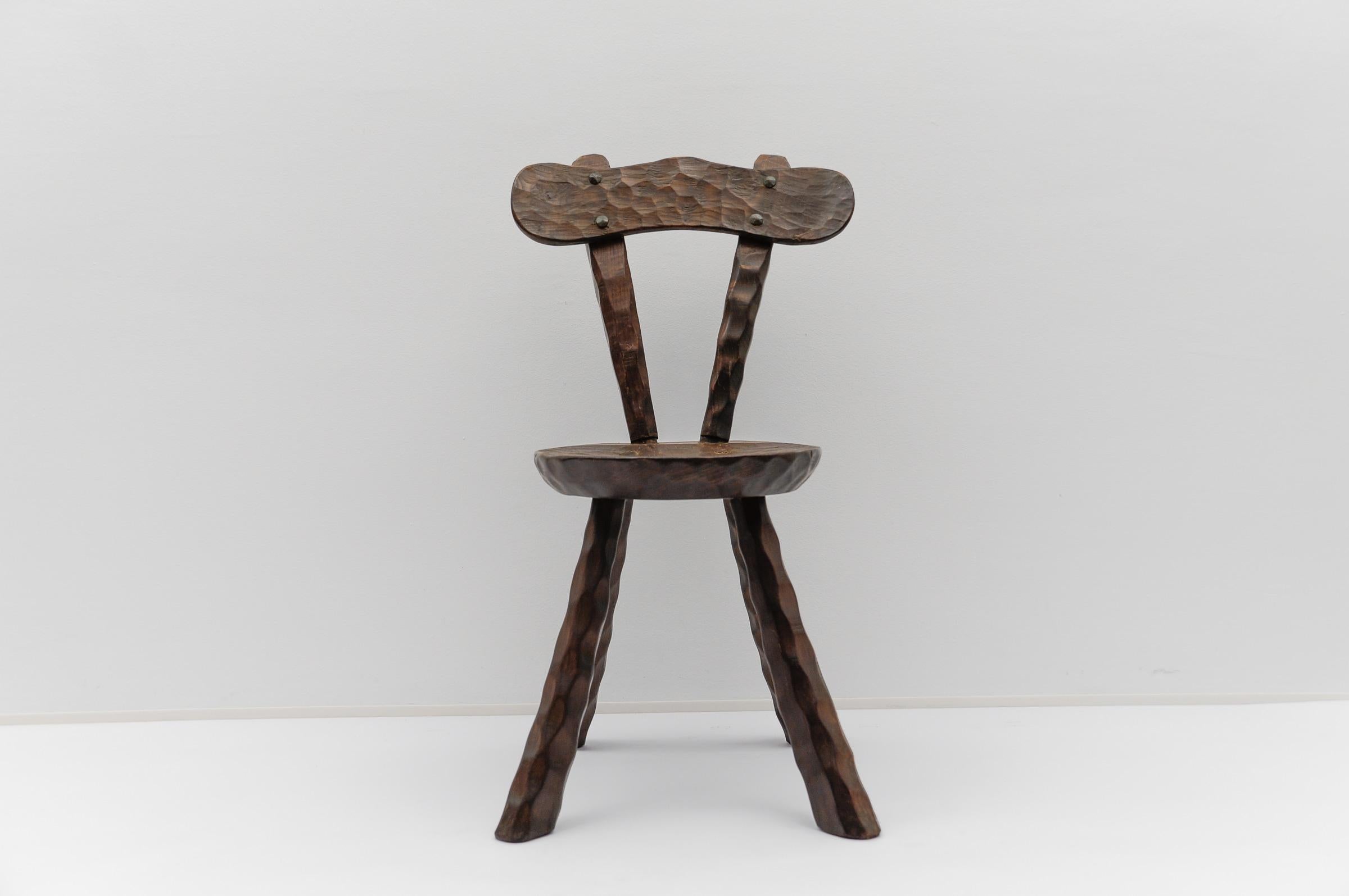 Rustic French Provincial Sculptured Chair in the Style of Alexandre Noll, 1960s

The seat width is 32 cm, the seat depth 37 cm and the seat height 39 cm. 
The overall width is 42cm, the overall depth is 47cm and the overall height is 77cm.
