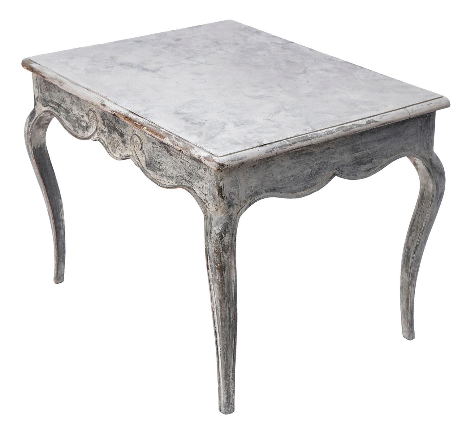 French Provincial occasional table with carved details on the apron.
Provincial style legs in the original whitewash finish.
The top has been newly finished to blend with the apron, then topped with durable clear wax.
20th century made, solid