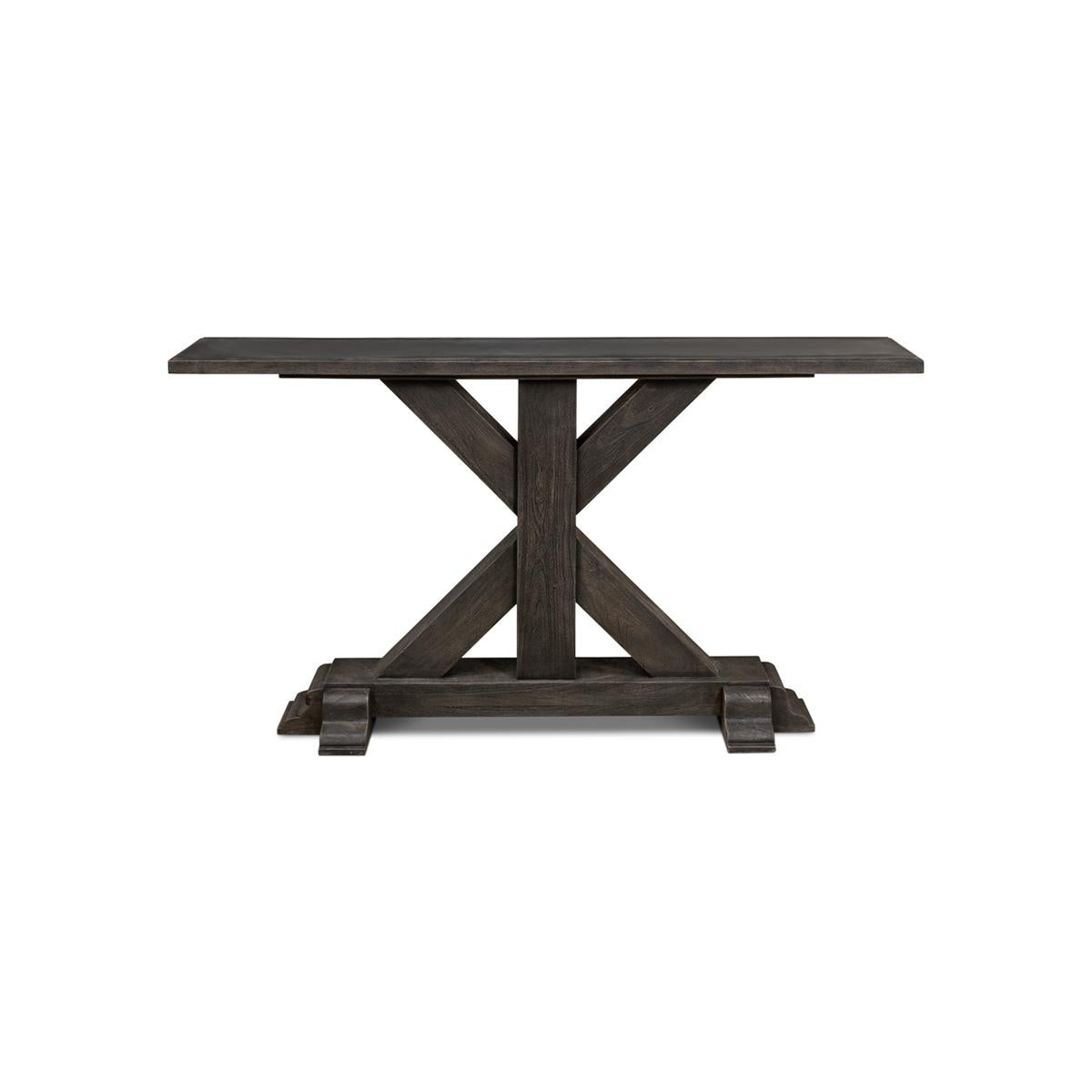 The Rustic grey industrial console is the perfect blend of vintage charm and modern functionality. The console features an inset iron slab top that adds a unique industrial touch to the piece. The iron slab top is supported by a bold X frame base