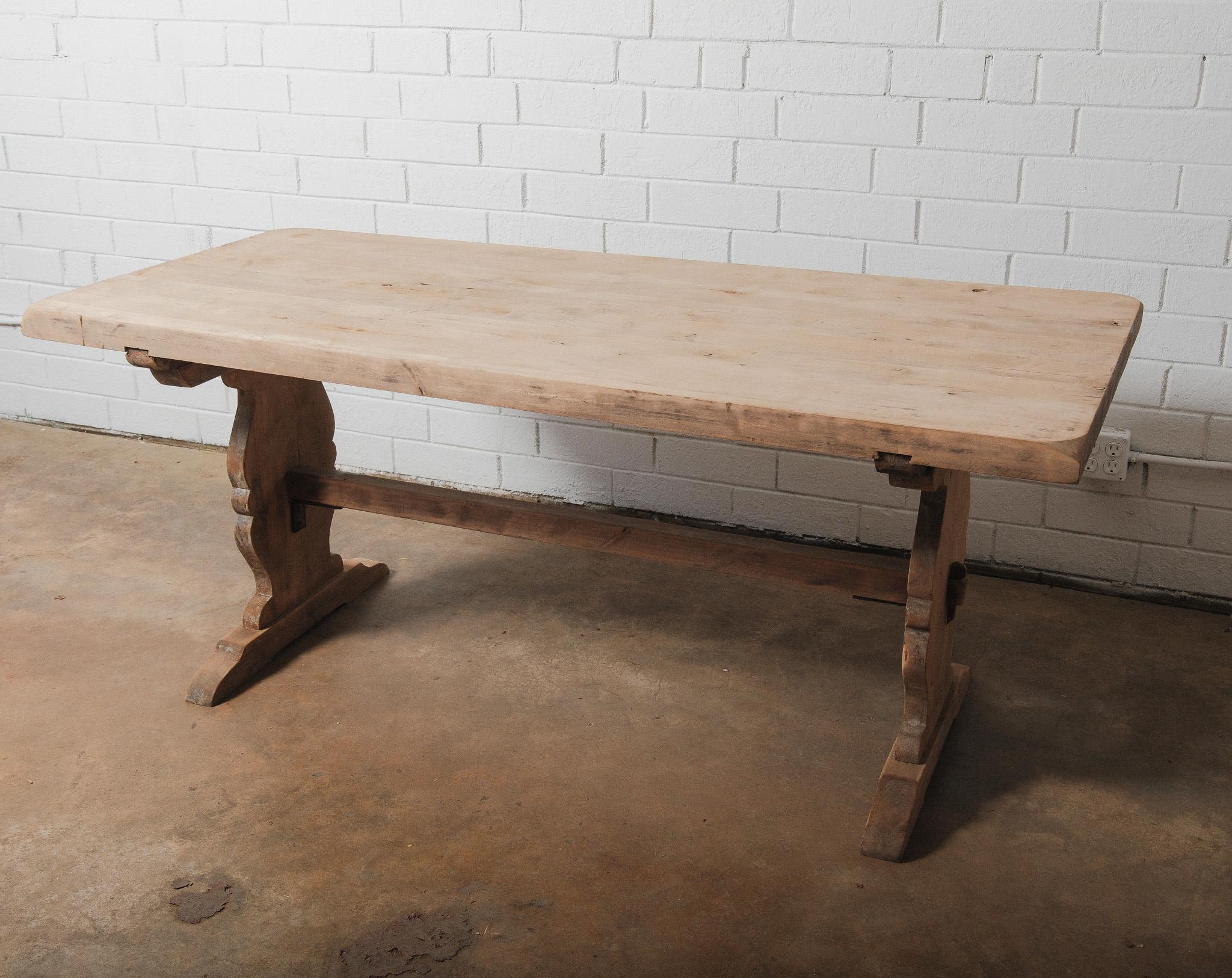 European Rustic Hand-Carved Pine Trestle Dining Table with Shaped Pedestal Base For Sale