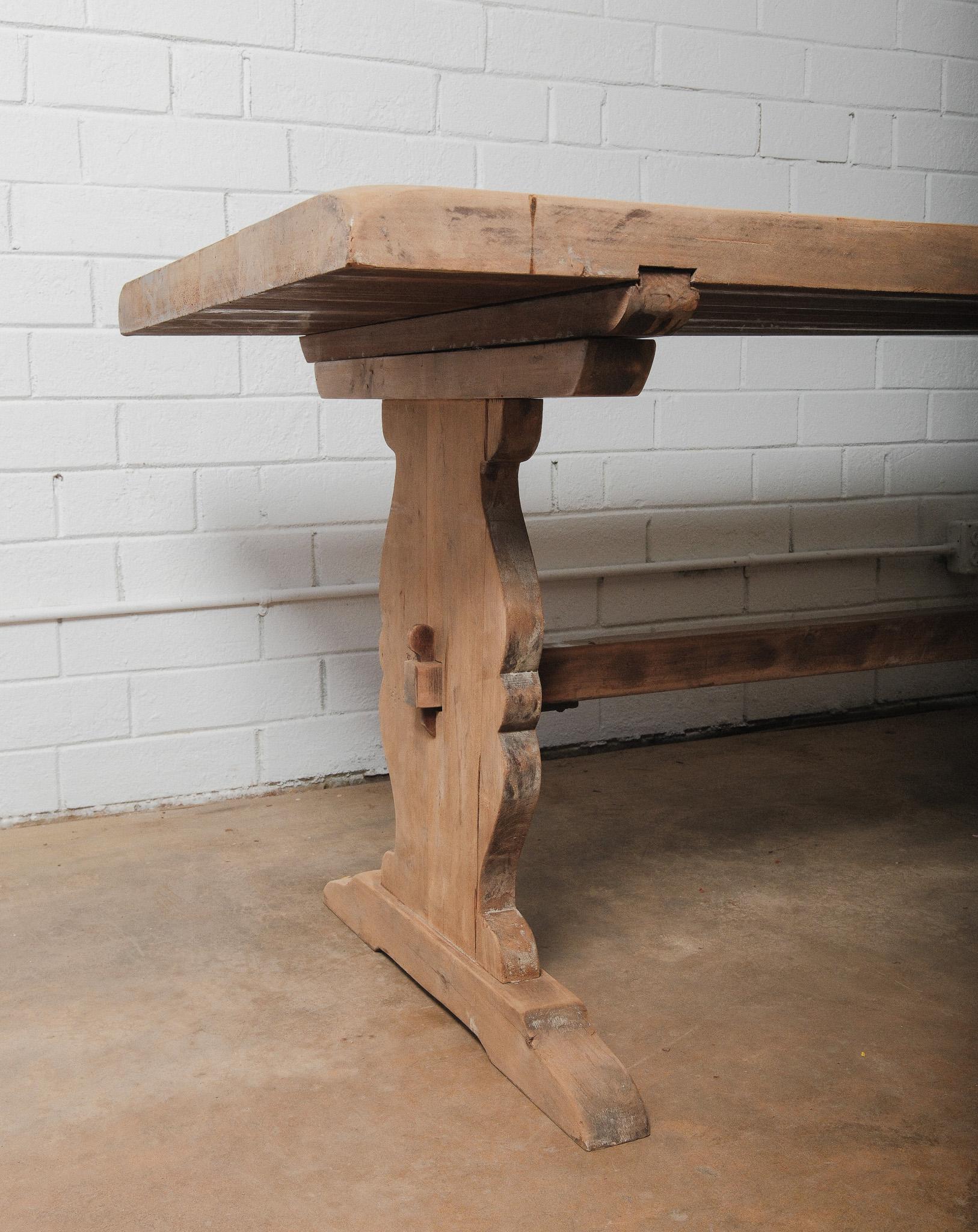 Rustic Hand-Carved Pine Trestle Dining Table with Shaped Pedestal Base In Good Condition For Sale In High Point, NC