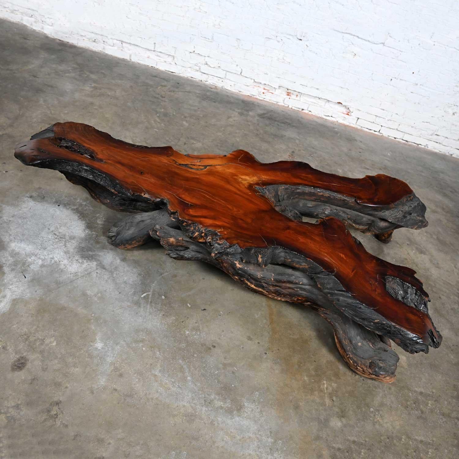 Fabulous vintage rustic handcrafted free form live edge solid slab burl redwood exceptionally large coffee table. Beautiful condition, keeping in mind that this is vintage and not new so will have signs of use and wear. Please see photos and zoom in
