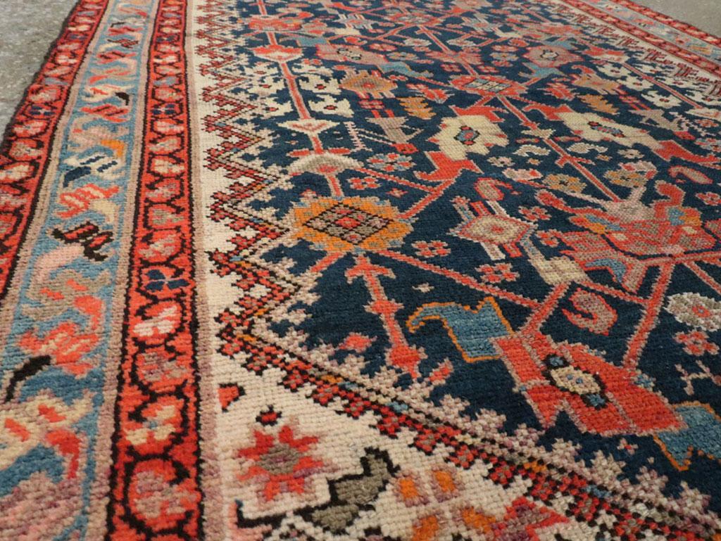 Rustic Handmade Persian Runner in Navy, Red, Ivory, and Light Blue In Good Condition For Sale In New York, NY