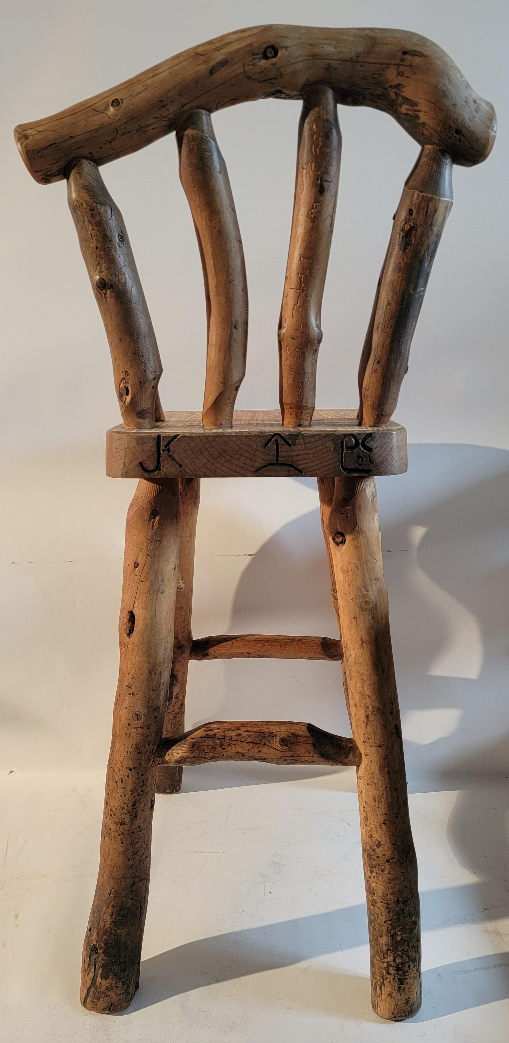 These rustic hickory bar stools are in great condition with minor marks and skits. The seats have the rustic cowboy branding iron marks or signs around the plank seats. They are a matching set of three bar stools. All are in sturdy condition. This