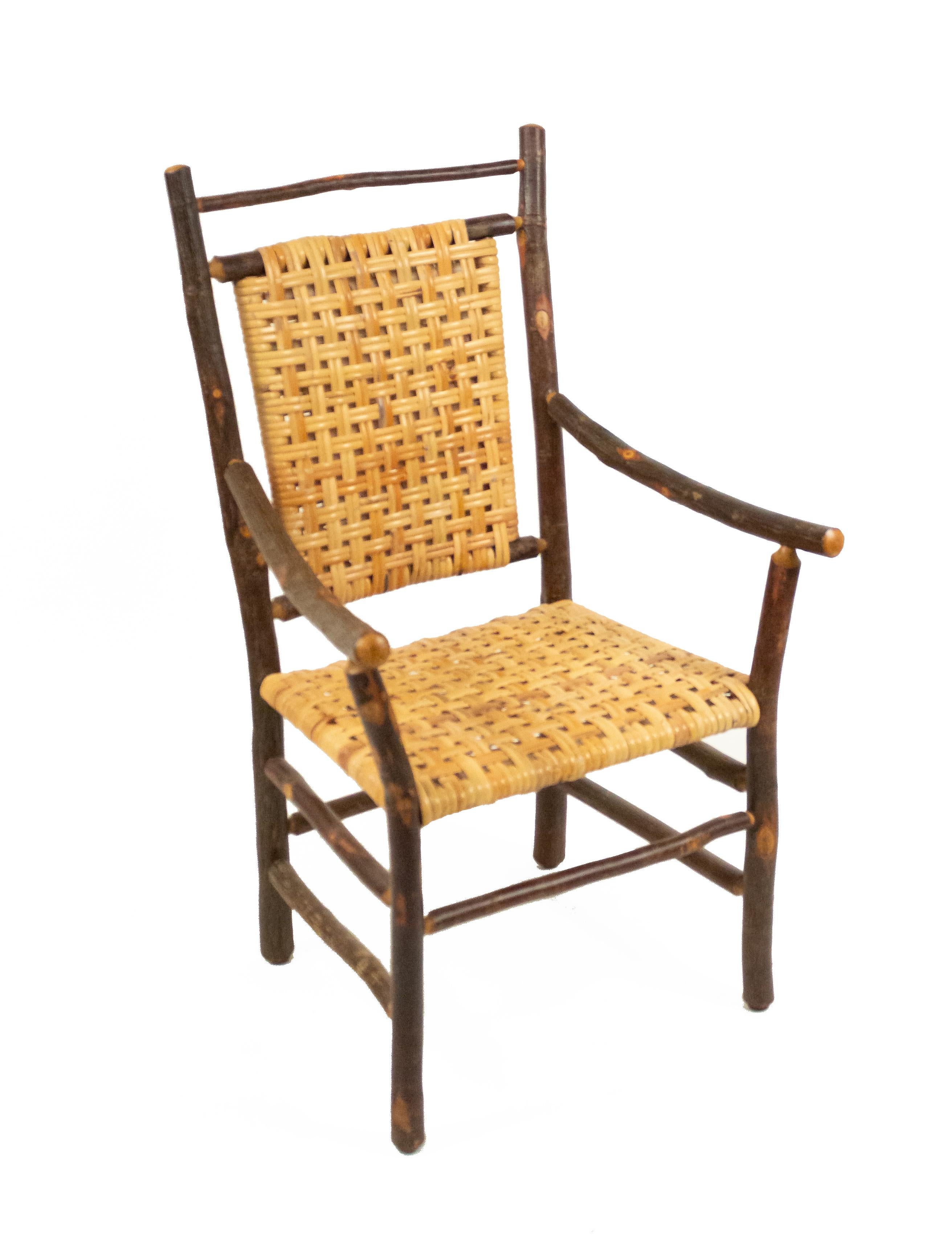 Set of 6 rustic old hickory (late 20th century) dining armchairs with woven cane seats and backs (brass old hickory tag).