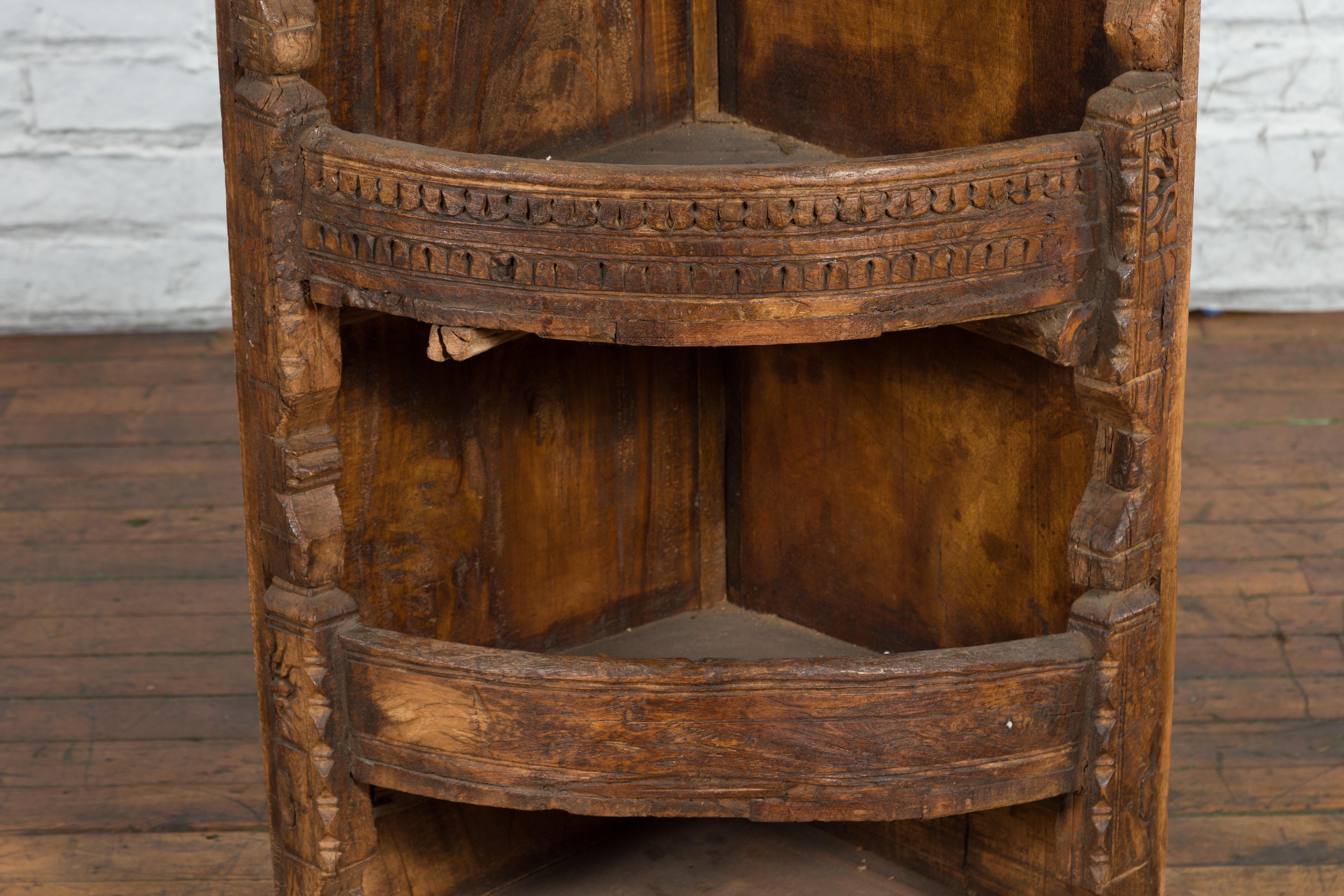 Wood Rustic Indian 19th Century Corner Cabinet with Carved Motifs and Shelves For Sale