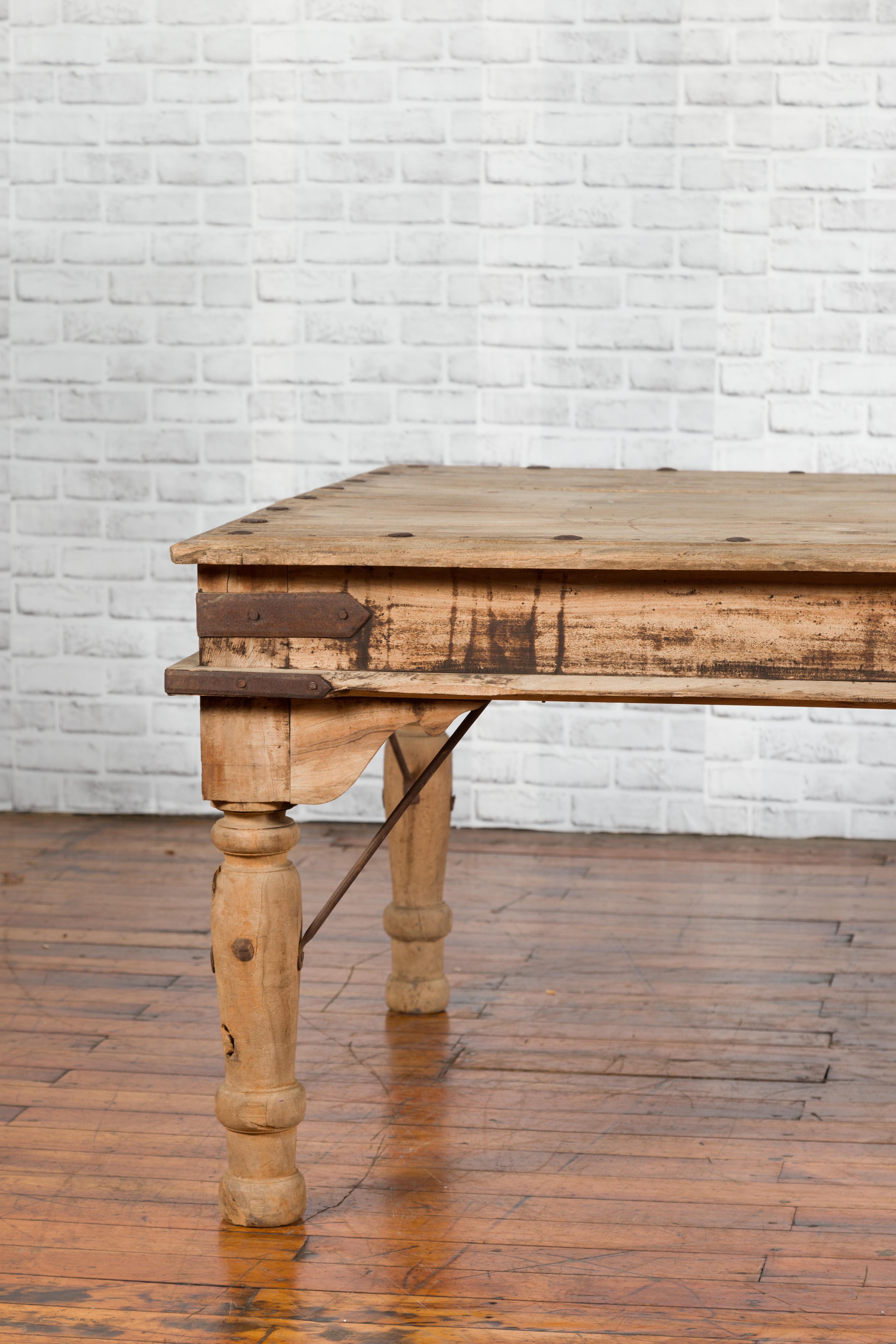20th Century Rustic Indian Low Table with Distressed Patina, Iron Details and Baluster Legs For Sale