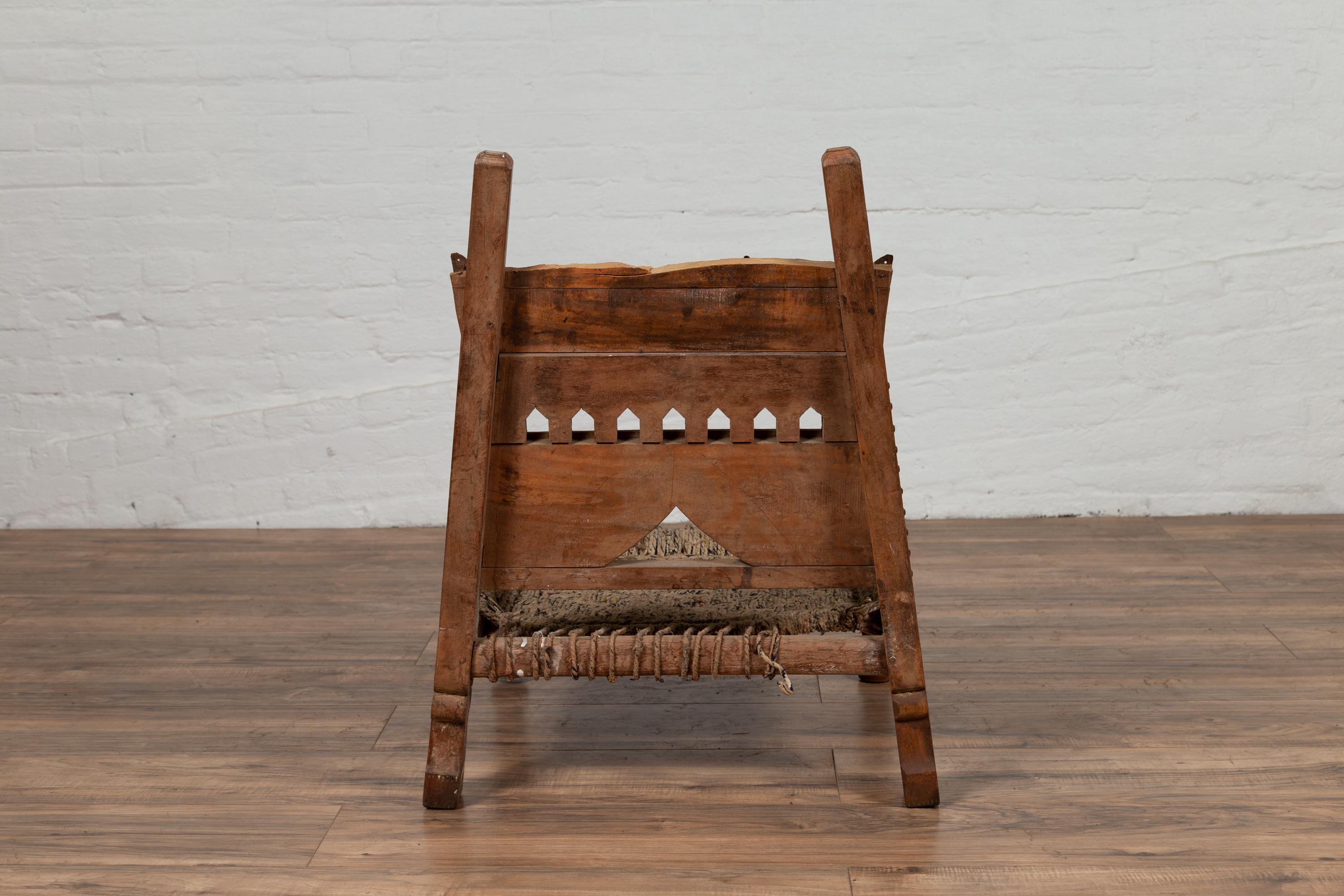 Rustic Indian Low Wooden Chair with Rope Seat and Weathered Appearance For Sale 6