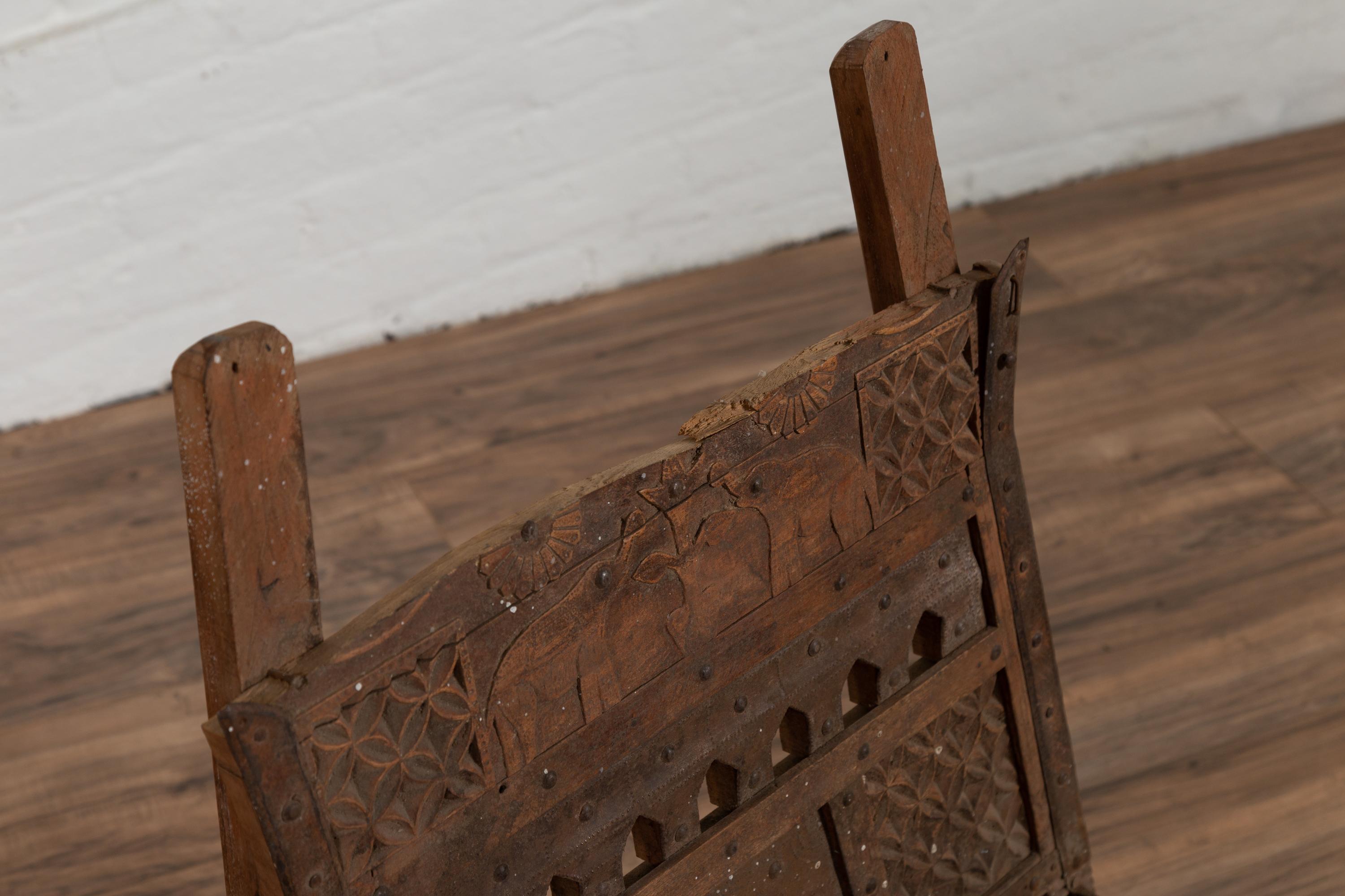 19th Century Rustic Indian Low Wooden Chair with Rope Seat and Weathered Appearance For Sale