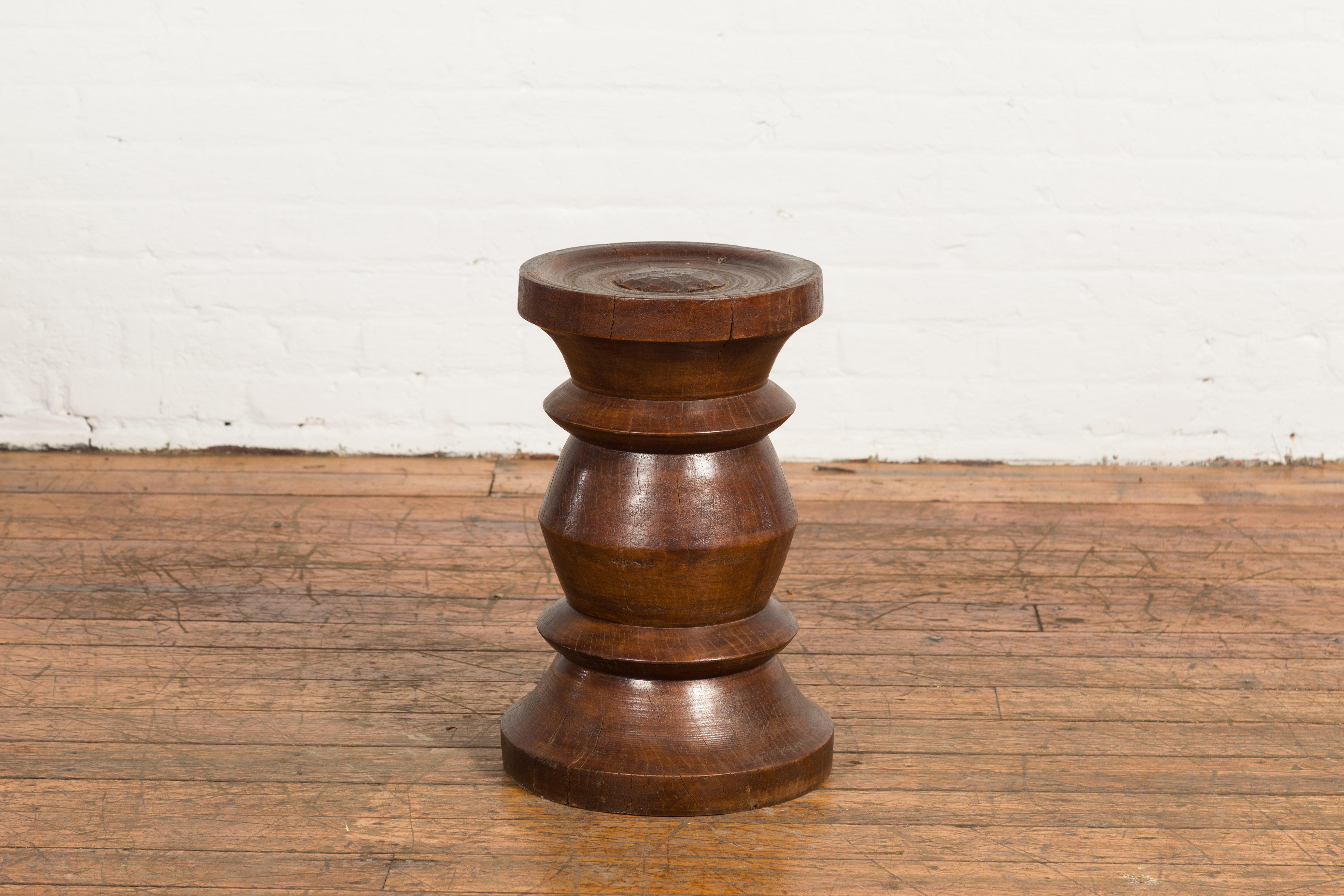 Rustic Indonesian 19th Century Solid Wood Turned Stool with Brown Patina In Good Condition For Sale In Yonkers, NY