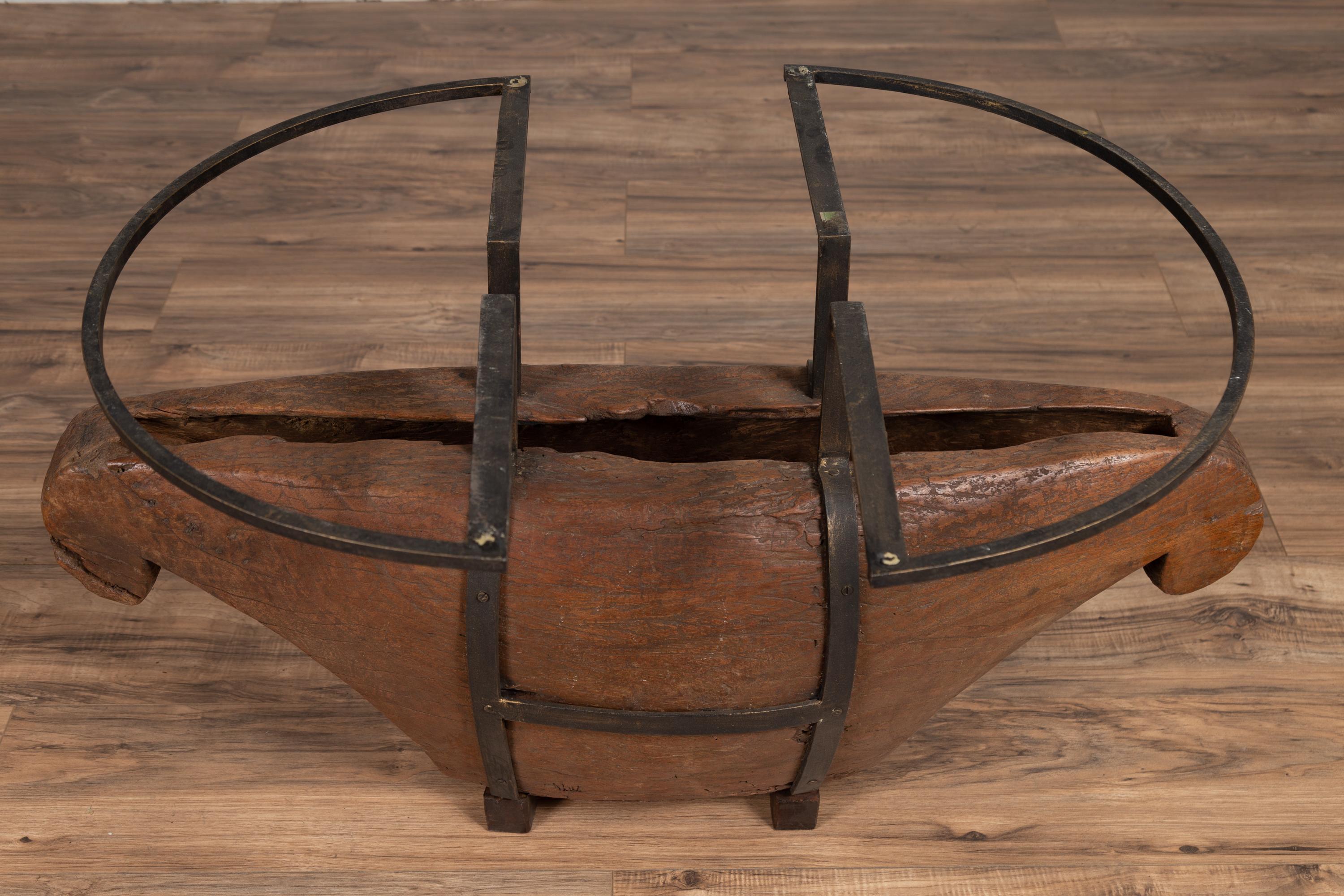 Rustic Indonesian Coffee Table Base Made of Antique Wood with Iron Supports 3