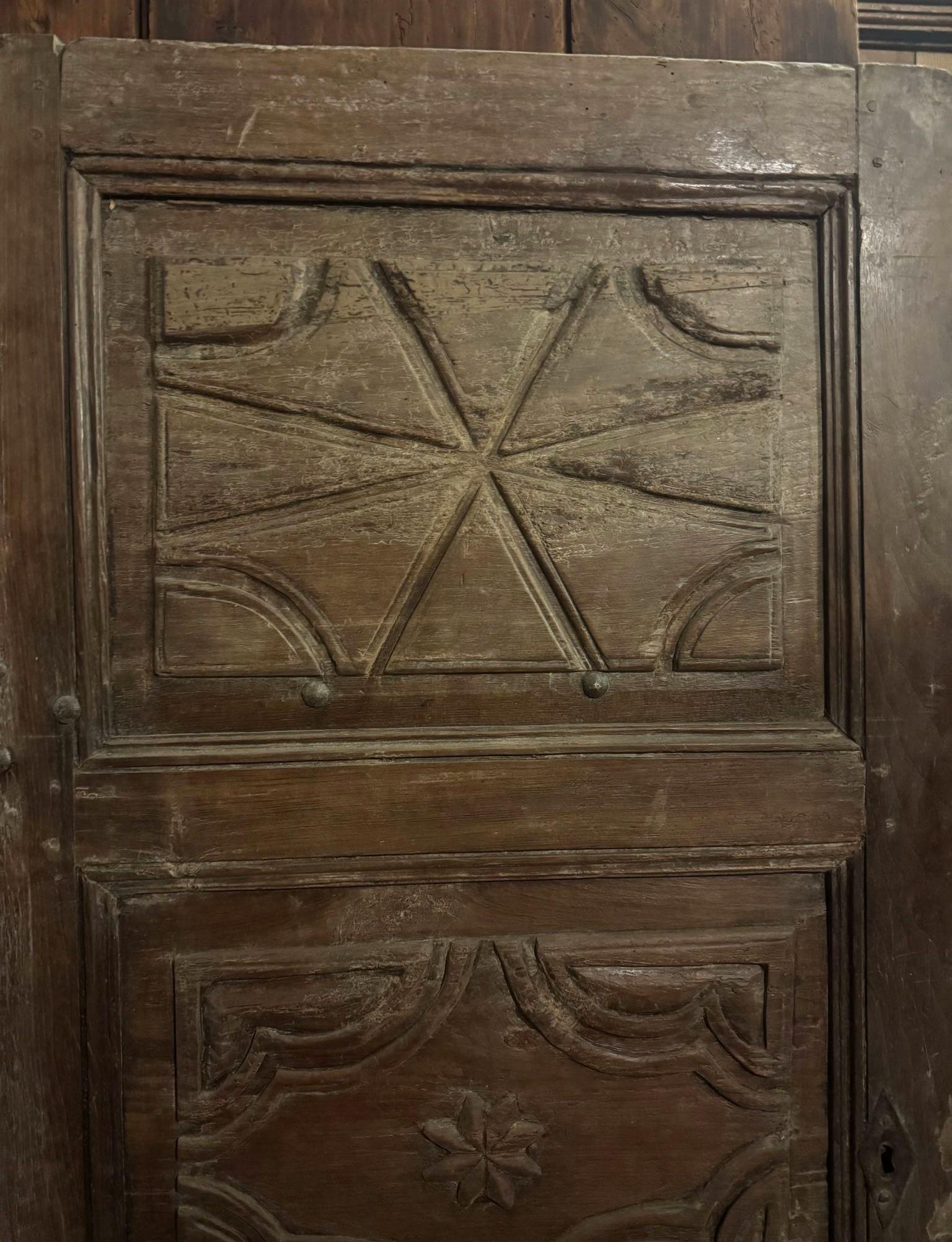 Italian Rustic interior door in carved walnut, smooth back, Italy For Sale