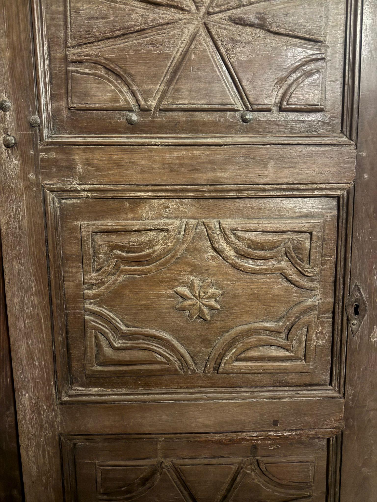 Hand-Carved Rustic interior door in carved walnut, smooth back, Italy For Sale