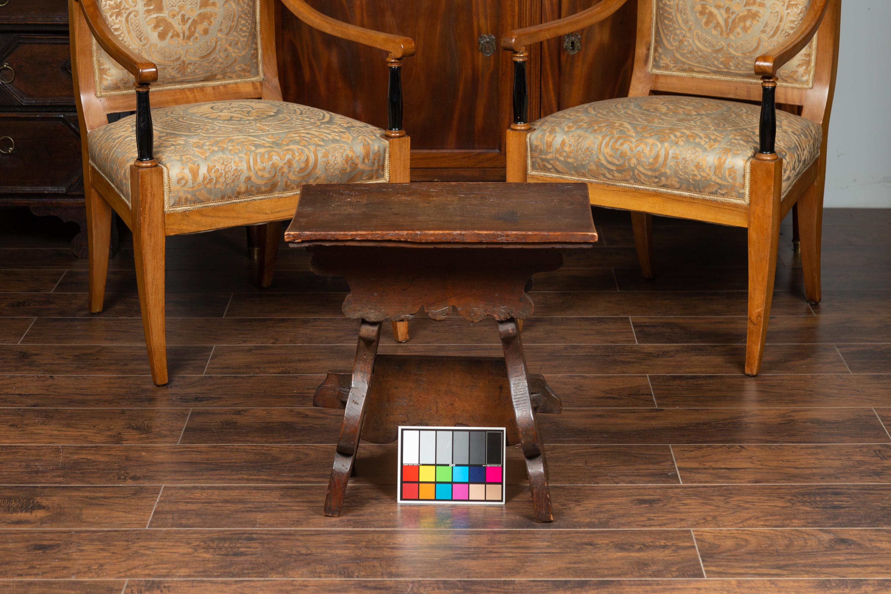 Rustic Italian 1800s Walnut Stool with Splaying Trestle Base and Carved Apron 9