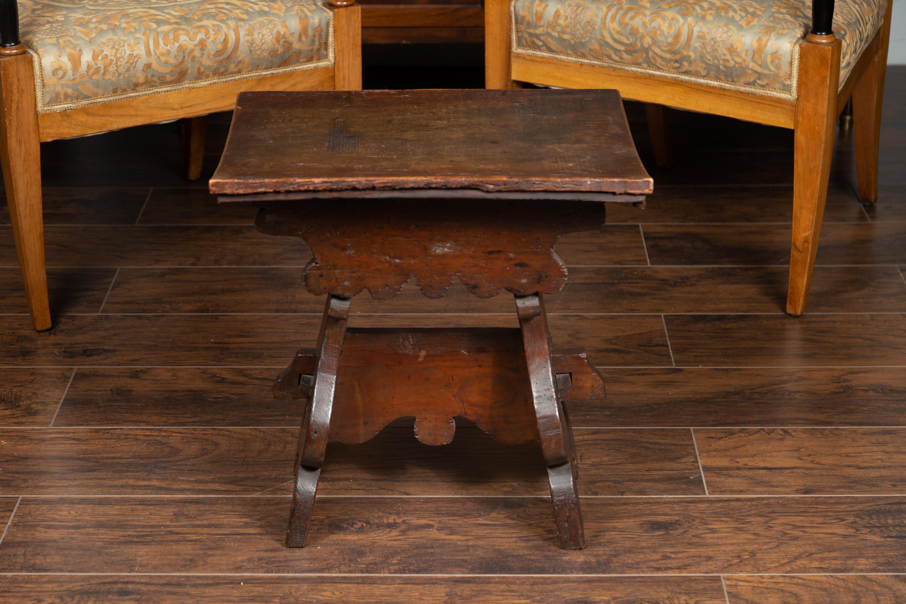 Rustic Italian 1800s Walnut Stool with Splaying Trestle Base and Carved Apron 5