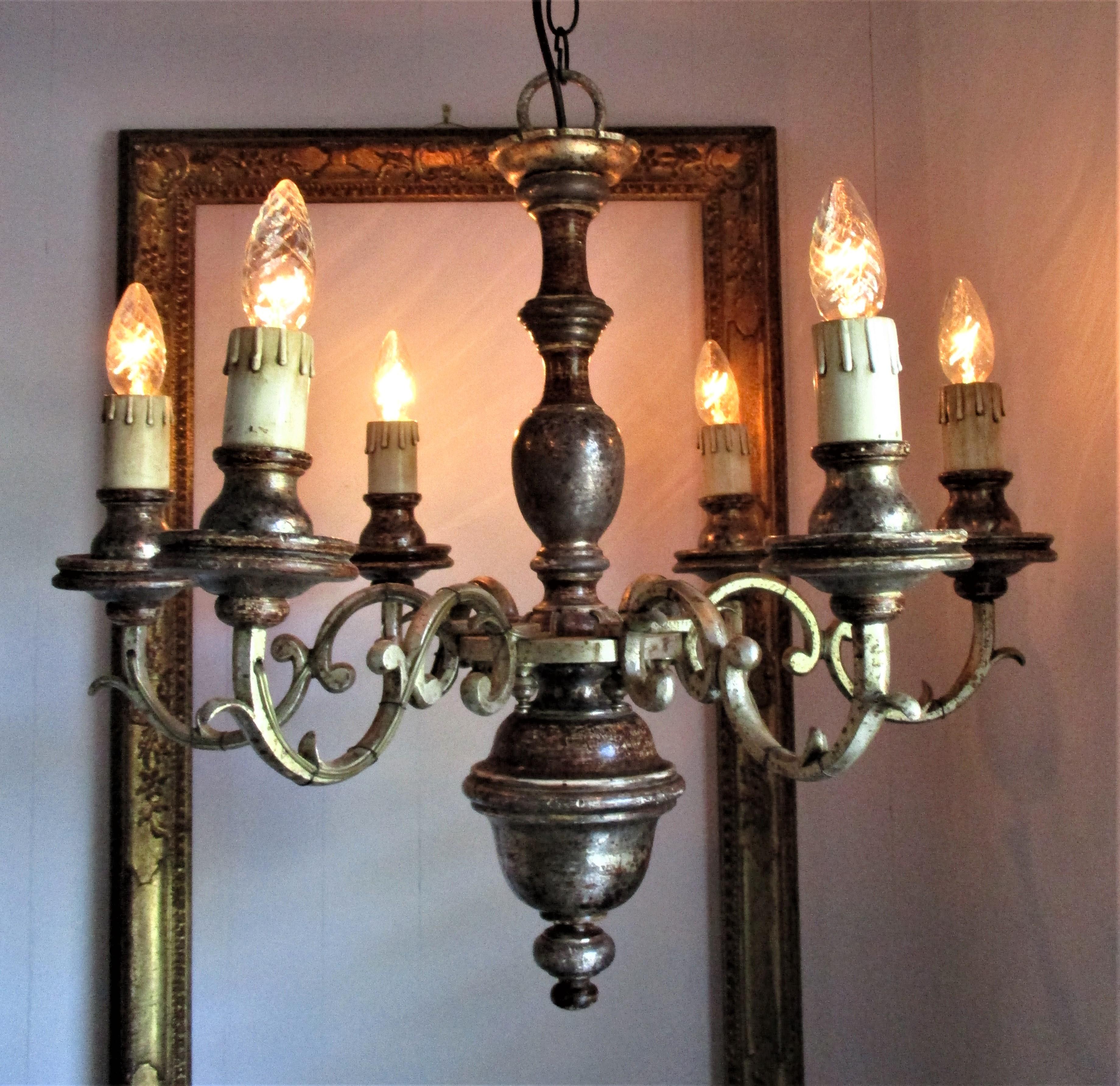Rustic Italian 19th century painted silver gilt iron 6-arm chandelier. Tuscan carved wood and iron chandelier with great character.