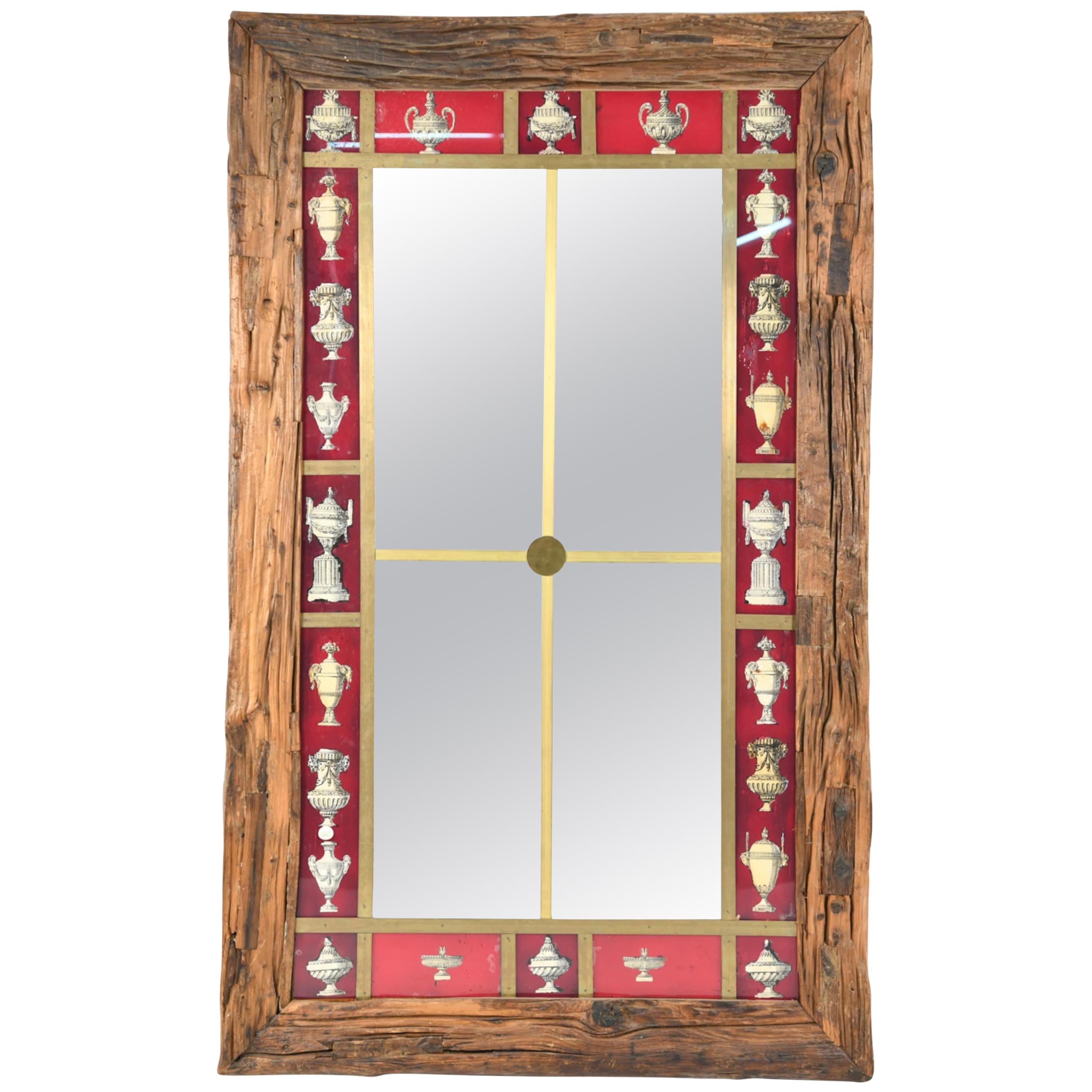 Rustic Italian wall mirror. Large wall mirror. Timber frame with reverse painted and mirrored glass. Brass trim.


1HH.