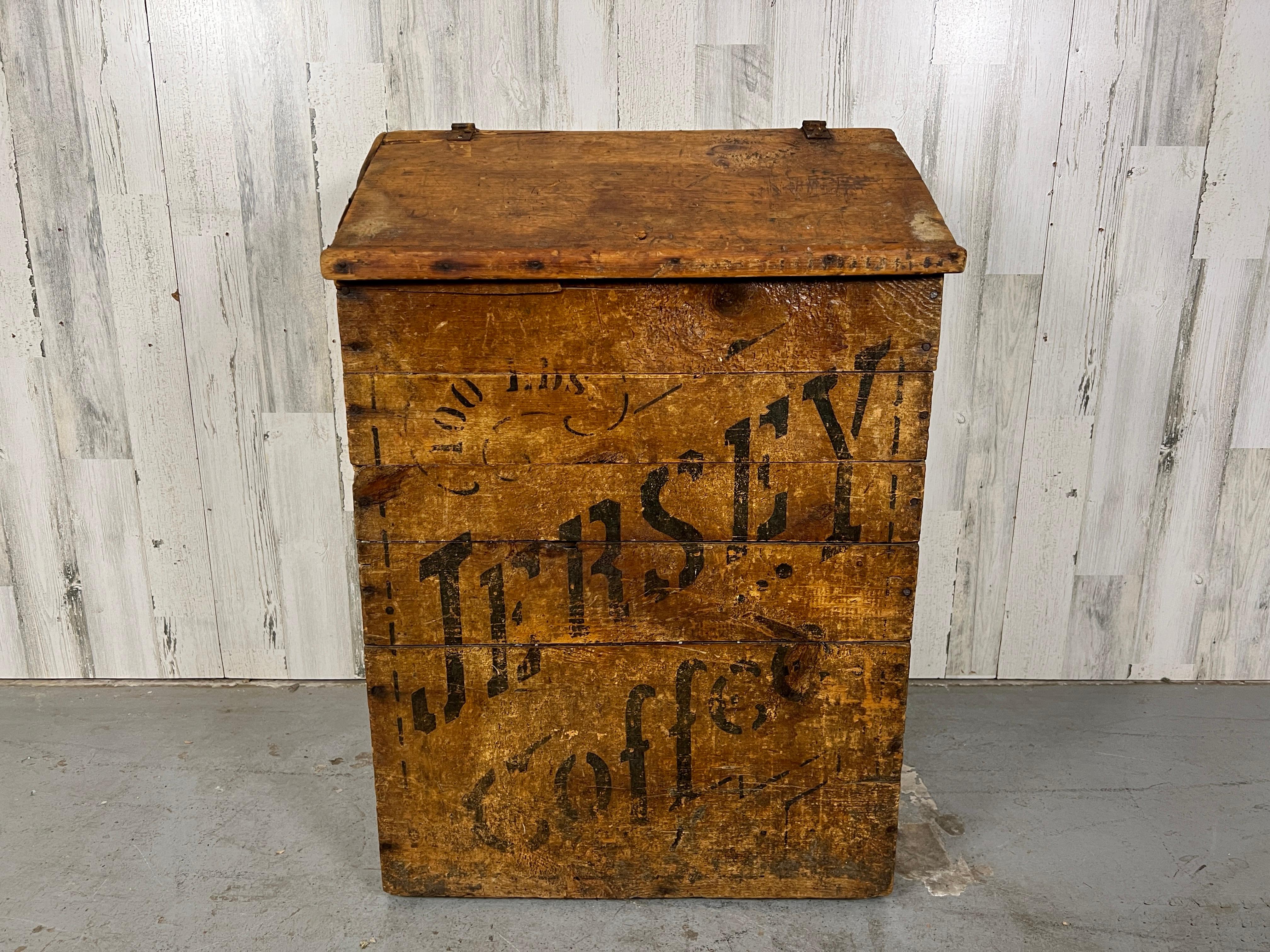 Primitive general store floor bin for the storage of 100lbs. of coffee. Solid planks of pine with painted design of Jersey Coffee. This would make a great trash can or storage of any kind in your home. This is in good usable item no restoration has