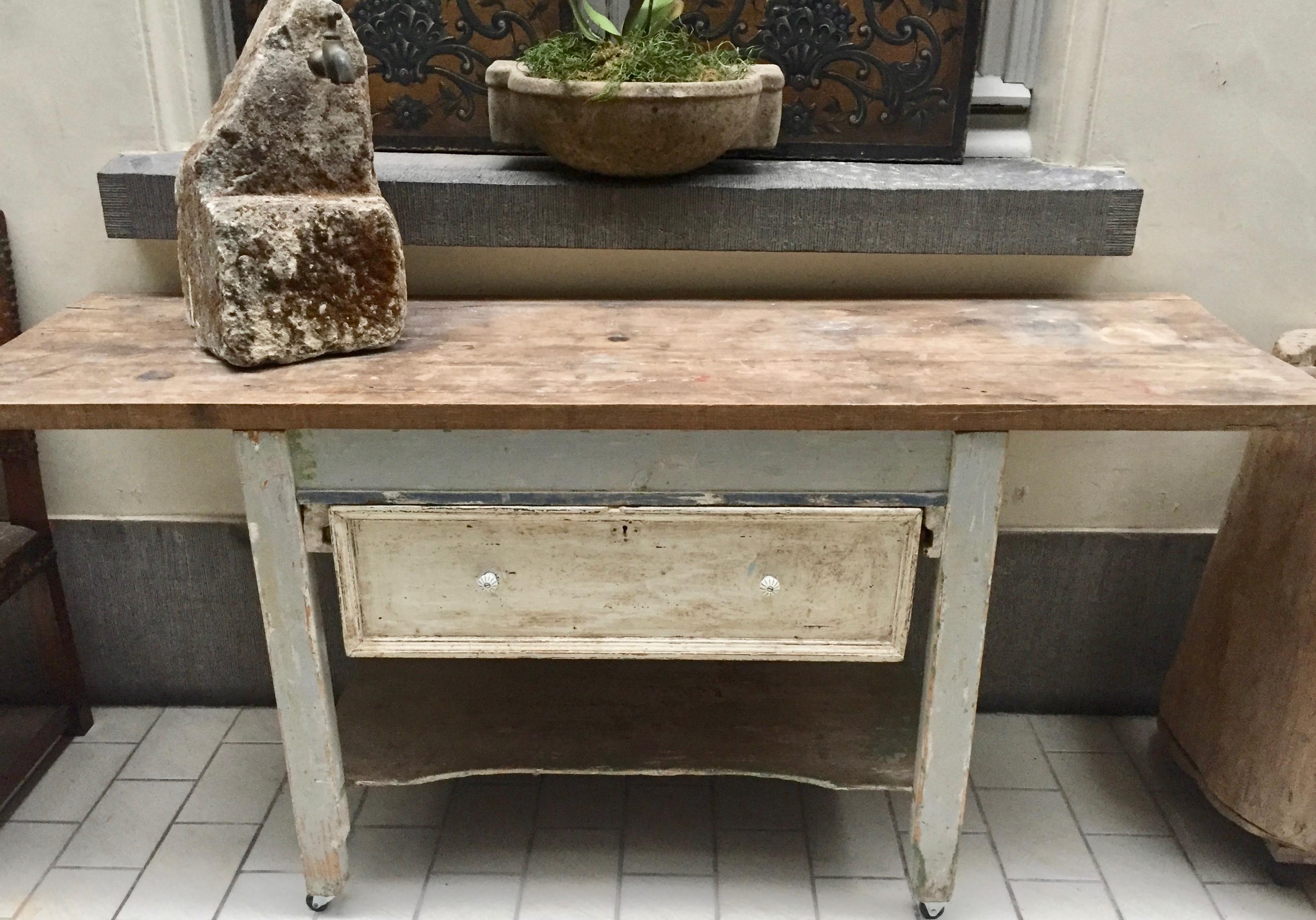 German country kitchen work table circa 1890-1910. The base has one very deep drawer
( with the original porcelain knobs) which was used to place dough to rise, but is now the perfect place for pots, measuring cups and baking dishes. The base has