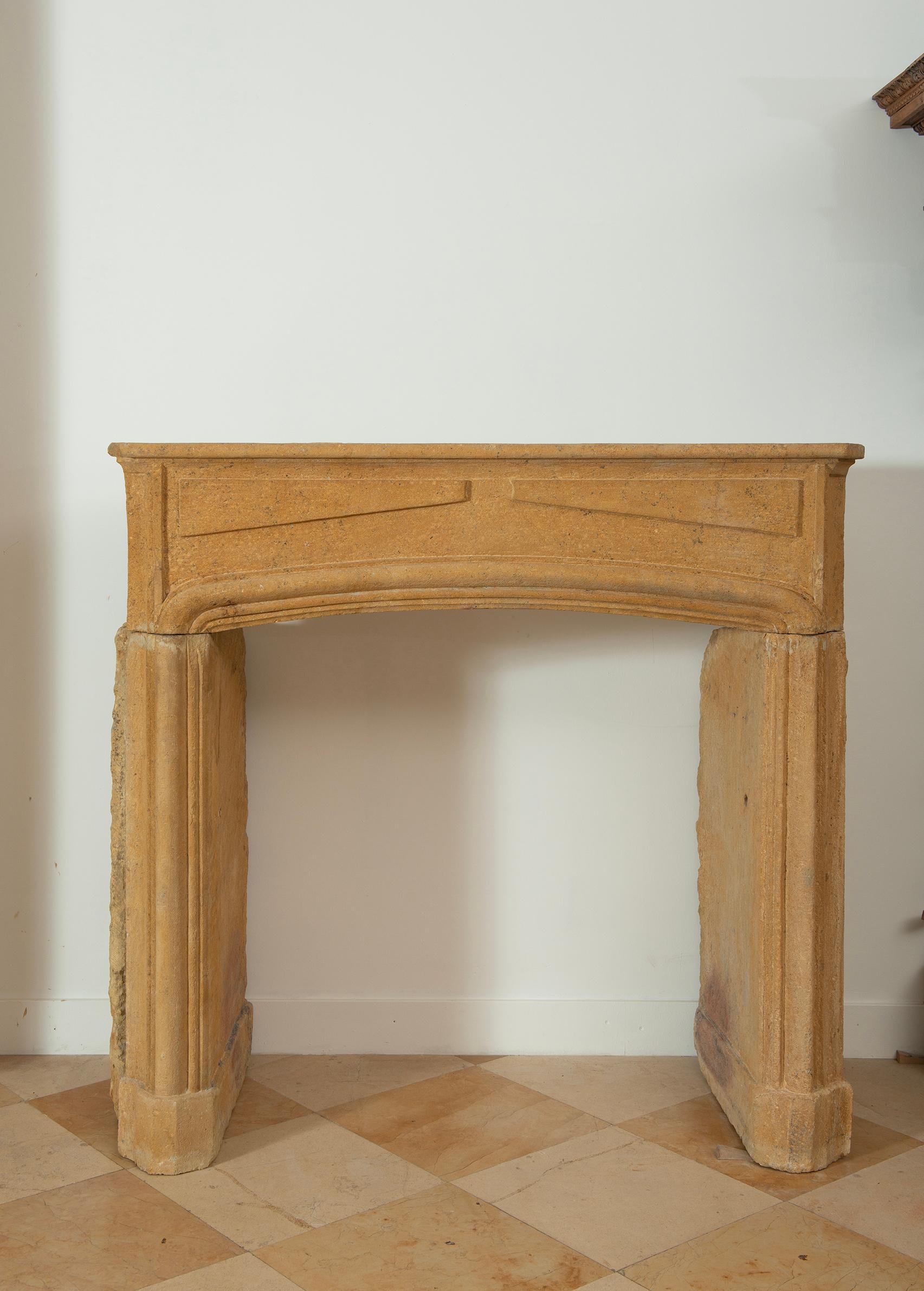 Original 18th century Louis XIV fireplace mantel from France.

Opening measurements: 39.7 x 38.1 inch (height x width).

Unrestored condition, nice patina, ready to be shipped and installed.