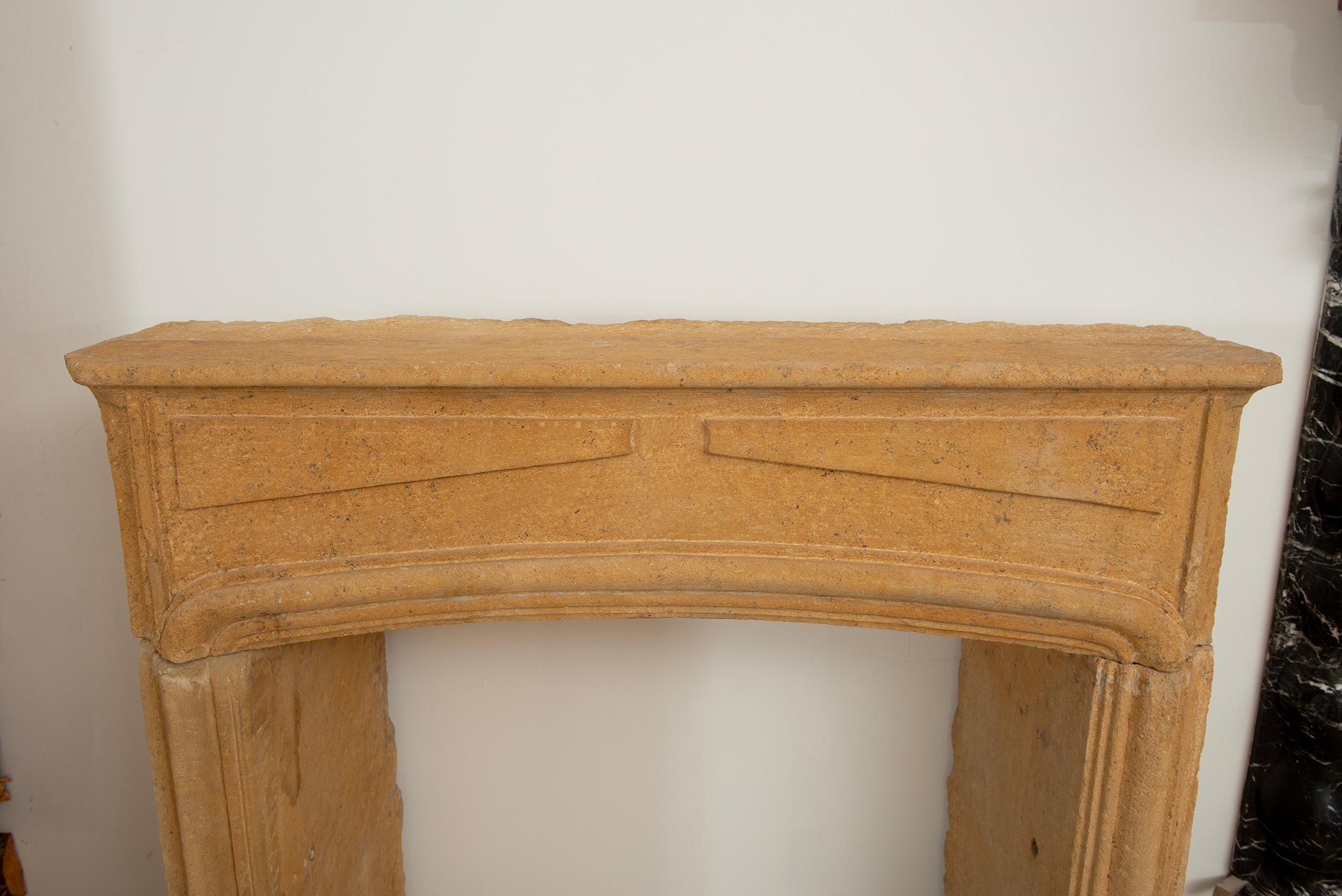 French Rustic Limestone Louis XIV Fireplace Mantel For Sale