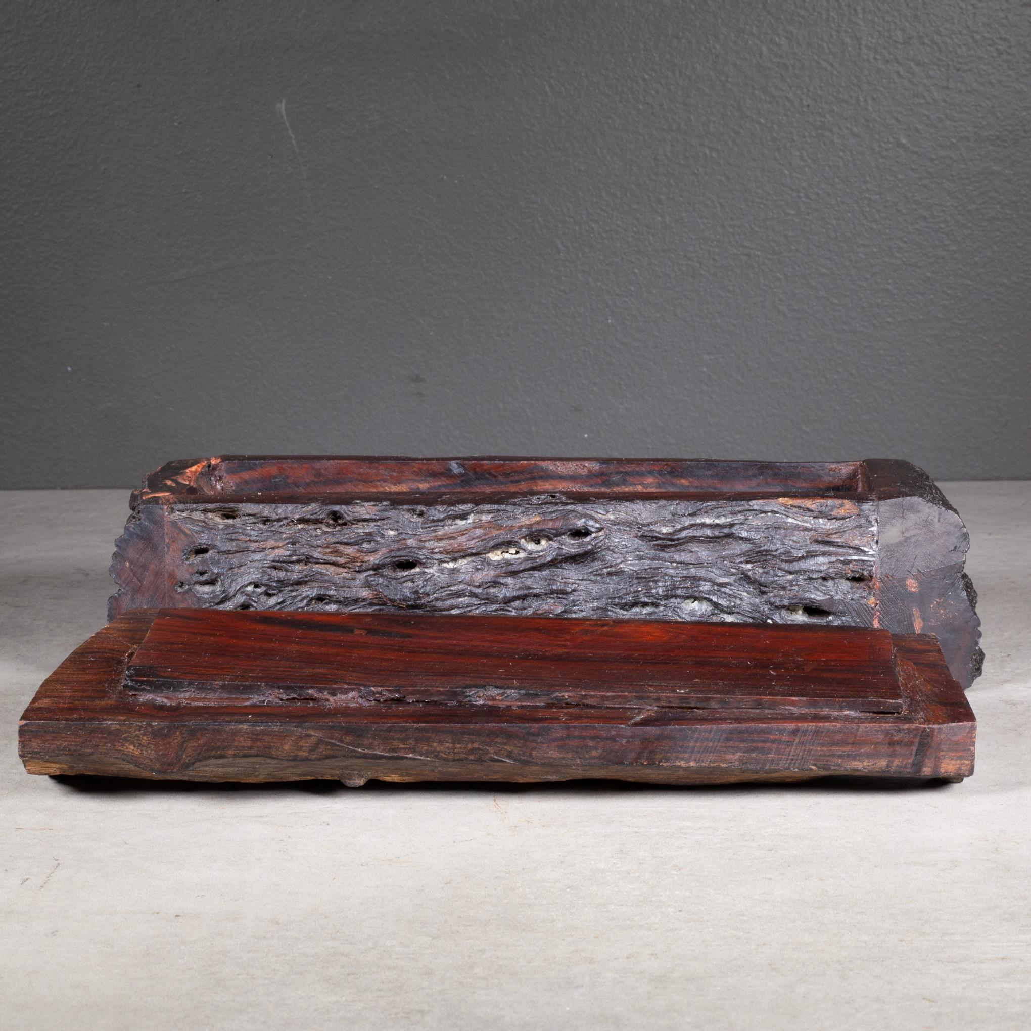 ABOUT

A handmade rustic live edge Rosewood box with lid, lined with felt. 

    CREATOR Unknown.
    DATE OF MANUFACTURE c.1940-1950.
    MATERIALS AND TECHNIQUES Rosewood, Felt. 
    CONDITION Good. Wear consistent with age and use.
    DIMENSIONS