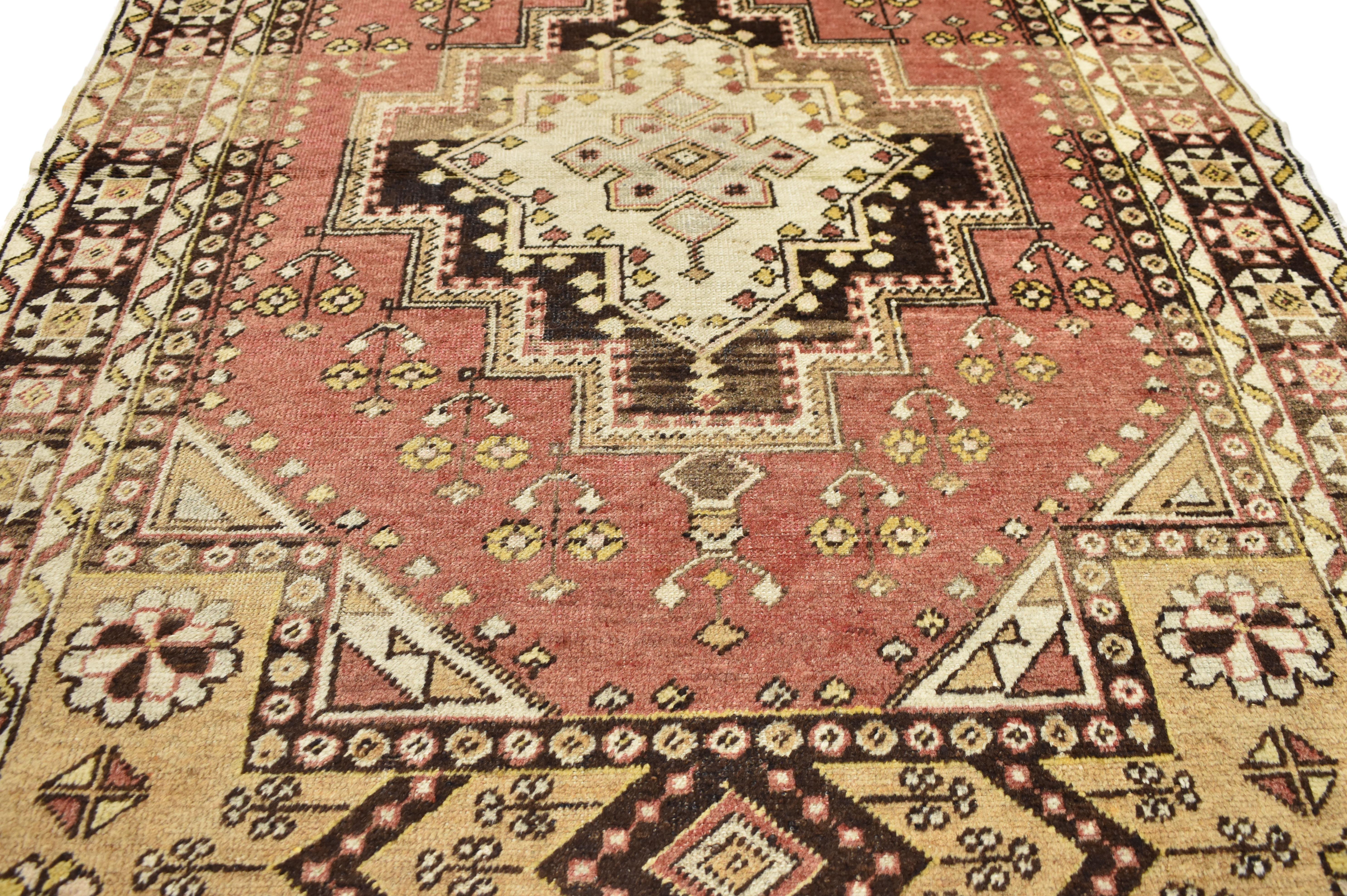 73922, vintage Turkish Oushak accent rug, entry or foyer rug. This hand knotted wool vintage Turkish Oushak rug features an almond colored eight-point star placed inside an espresso-coffee colored stepped medallion floating in a rustic brick red